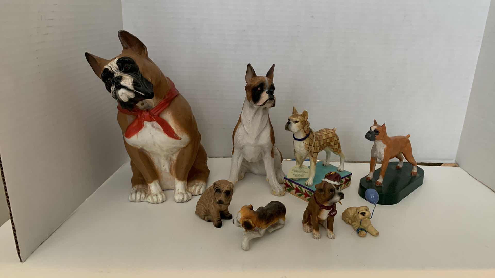 Photo 1 of 8 PCS BOXER DOG FIGURES