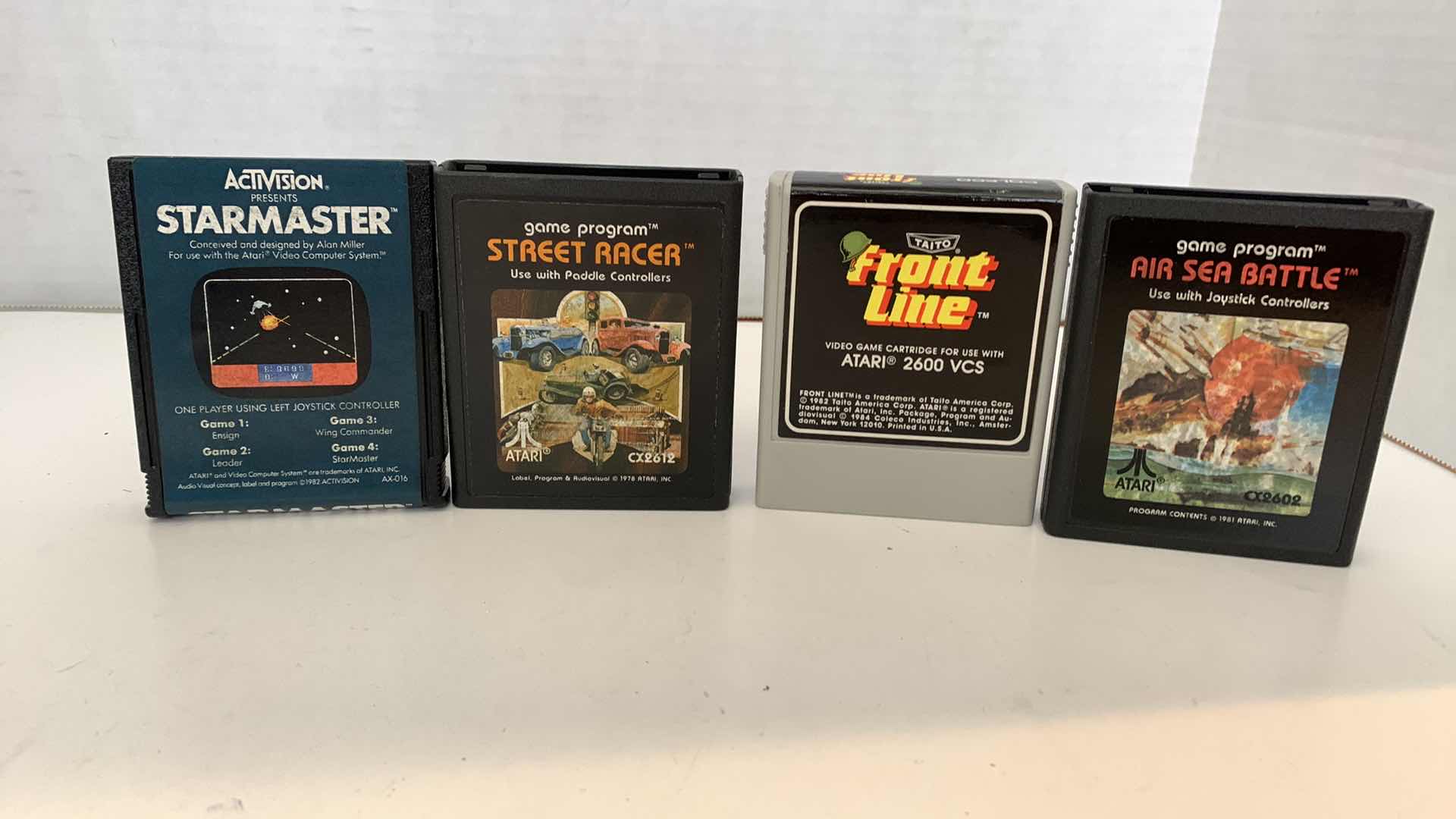 Photo 1 of 4 PCS VINTAGE ATARI 2600 GAMES: STARMASTER, STREET RACER, FRONT LINE, AIR SEA BATTLE
