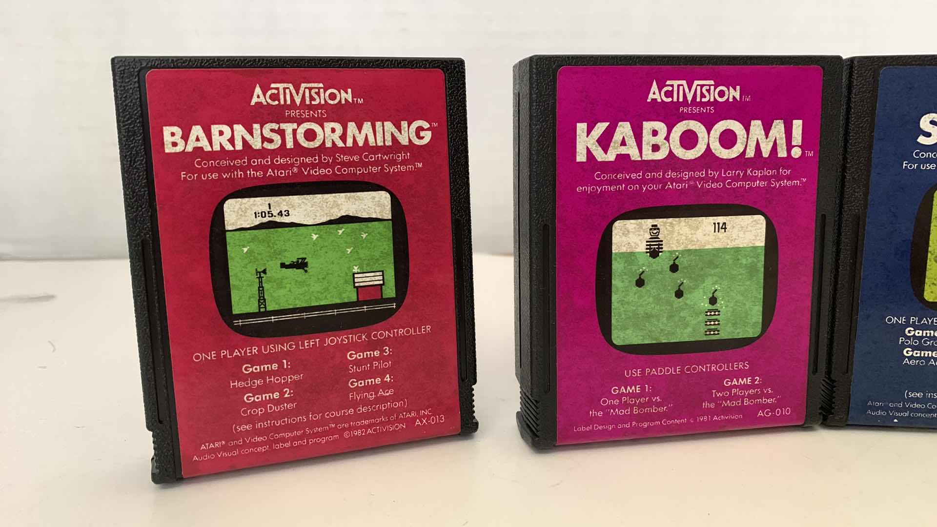 Photo 1 of 4 PCS VINTAGE ATARI 2600 GAMES:BARNSTORMING,KABOOM,SKY JINKS, AND RIVER RAID