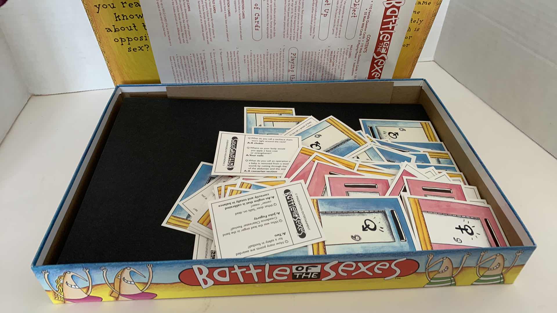 Photo 1 of BATTLE OF THE SEXES BOARD GAME