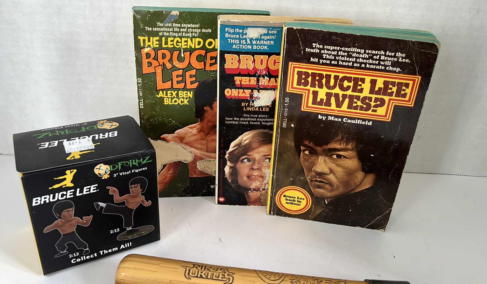 Photo 1 of BRUCE LEE COLLECTIBLES BOOKS VINYL FIGURES NUNCHUCKS