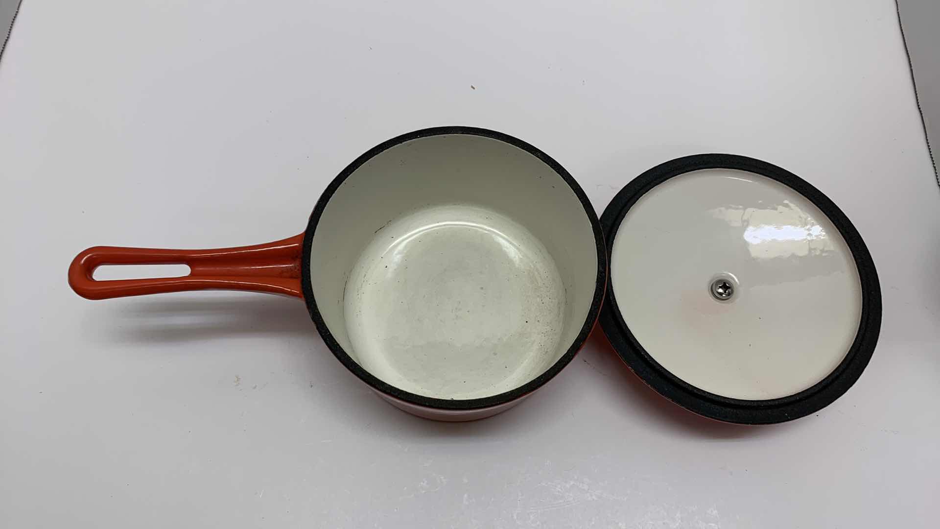 Photo 1 of CAST IRON RED SAUCE PAN 5.75” WIDE