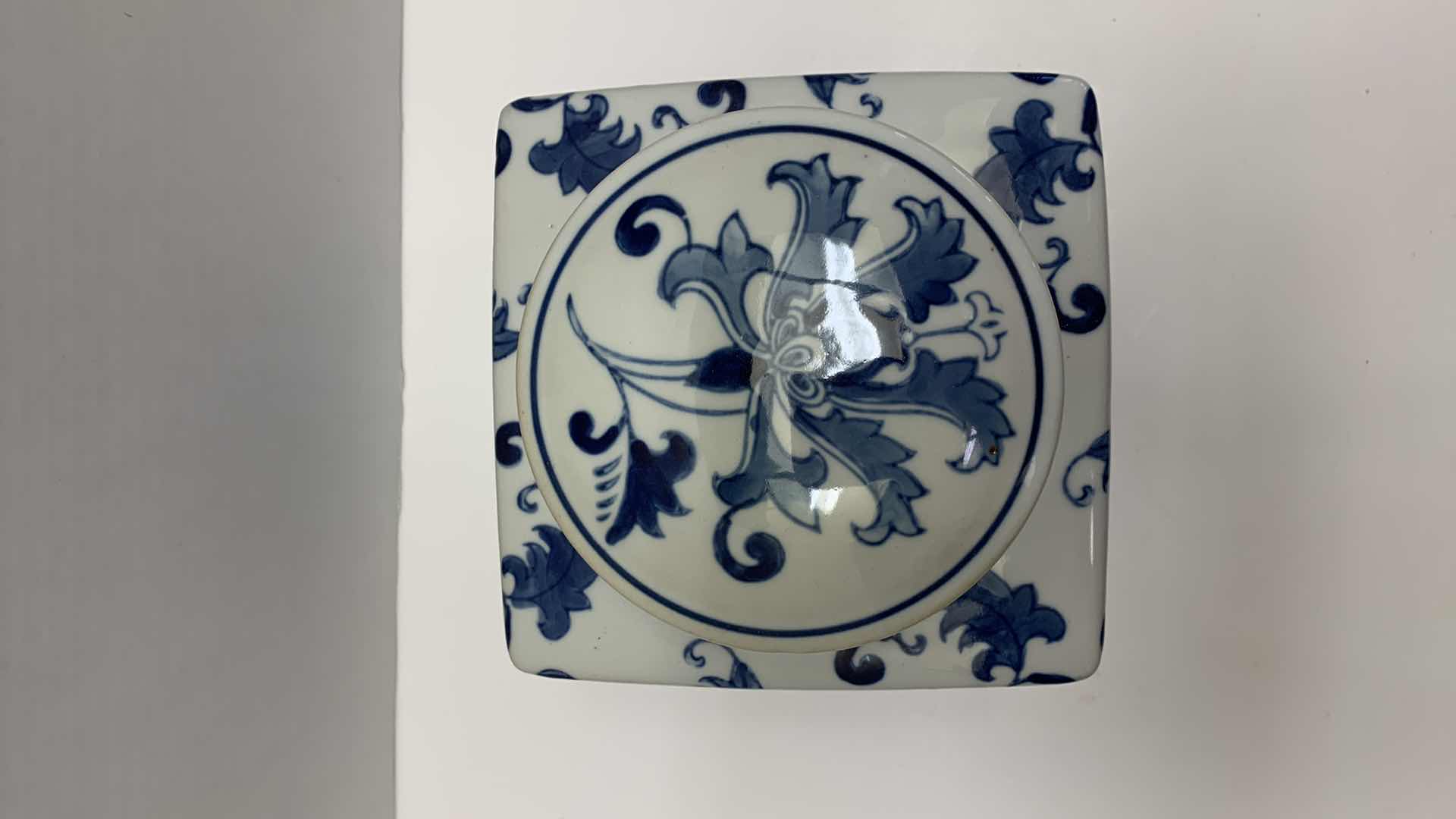 Photo 1 of CERAMIC WHITE AND BLUE JAR 6” X 8”