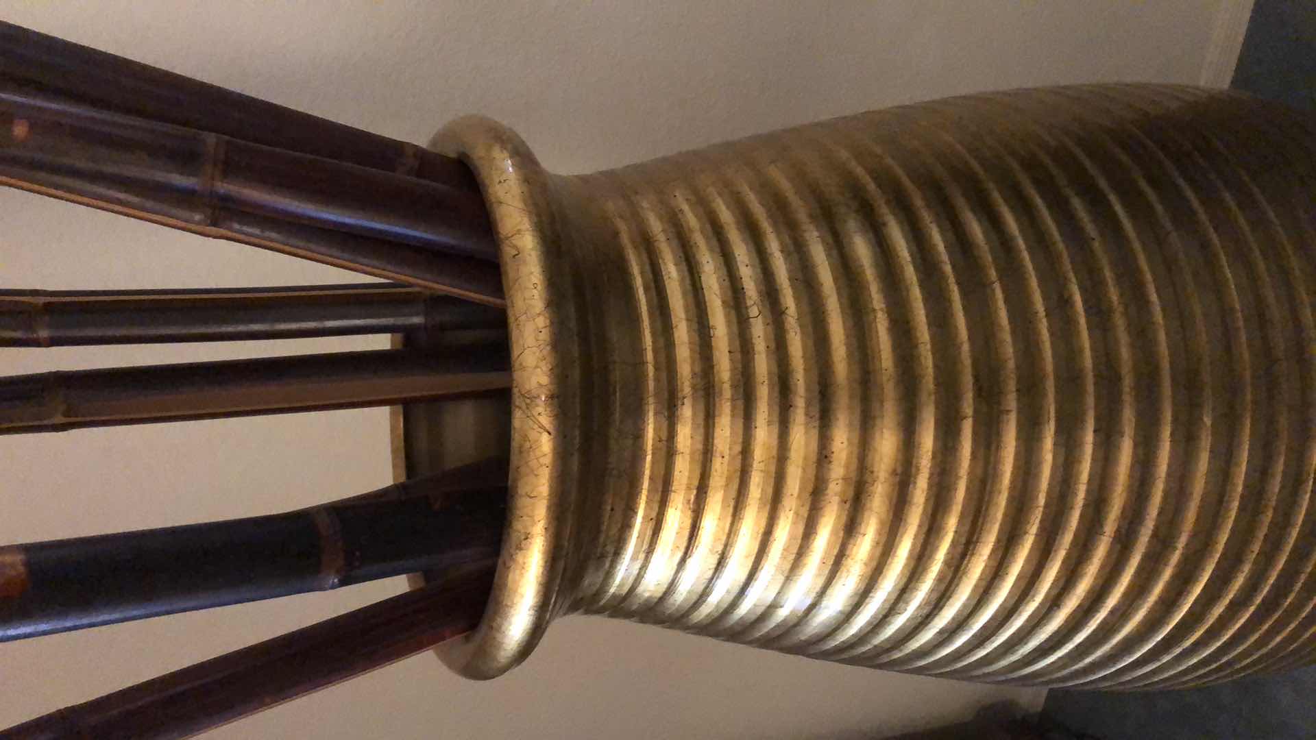 Photo 1 of EXTRA LARGE METAL URN INSPIRED VASE 23” H 49”WITH BAMBOO POLES