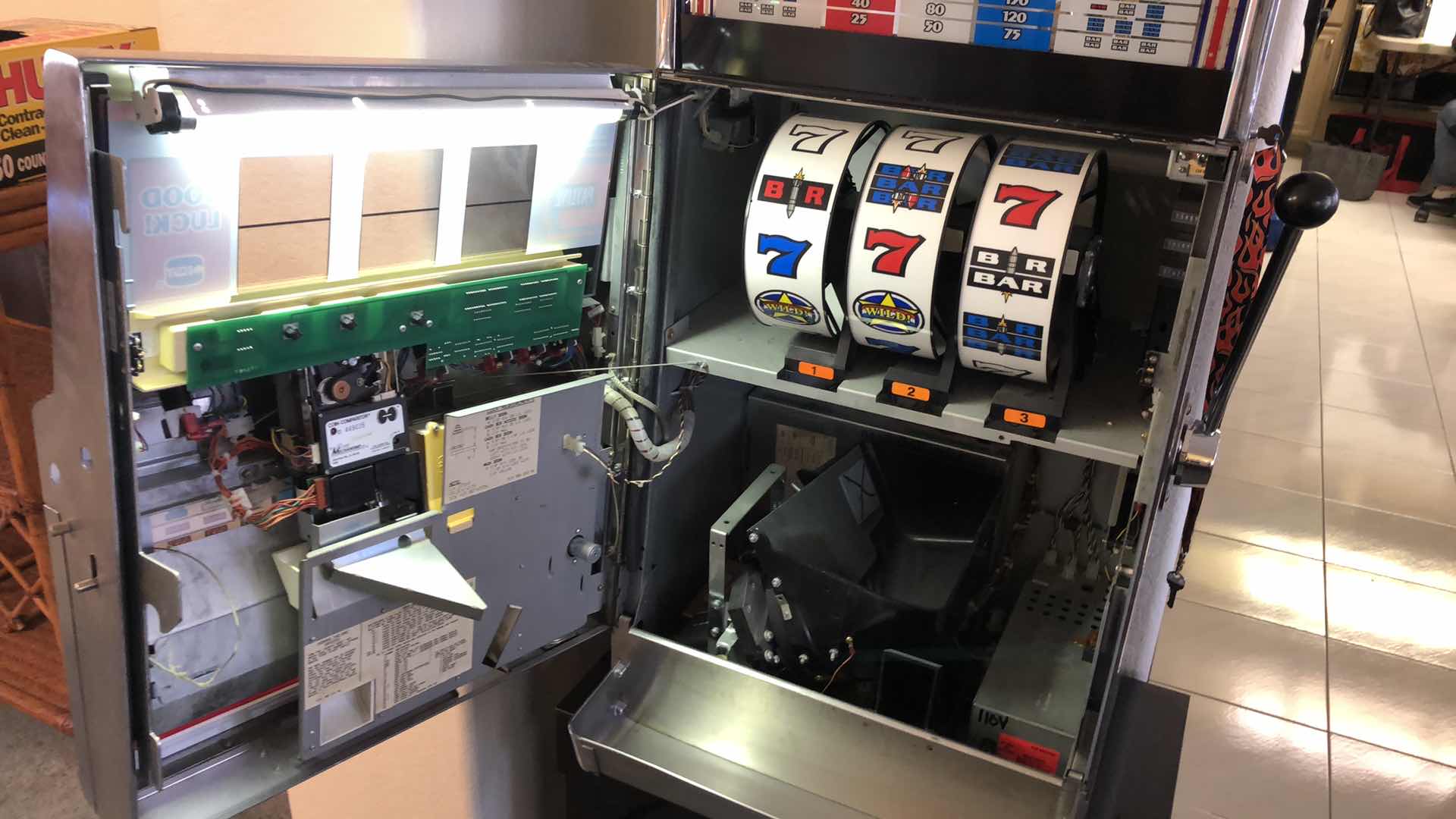 Photo 1 of LAS VEGAS IGT 1994 CLASSIC RED WHITE AND BLUE SLOT MACHINE WITH PEDESTAL 21” X 25” H 61”