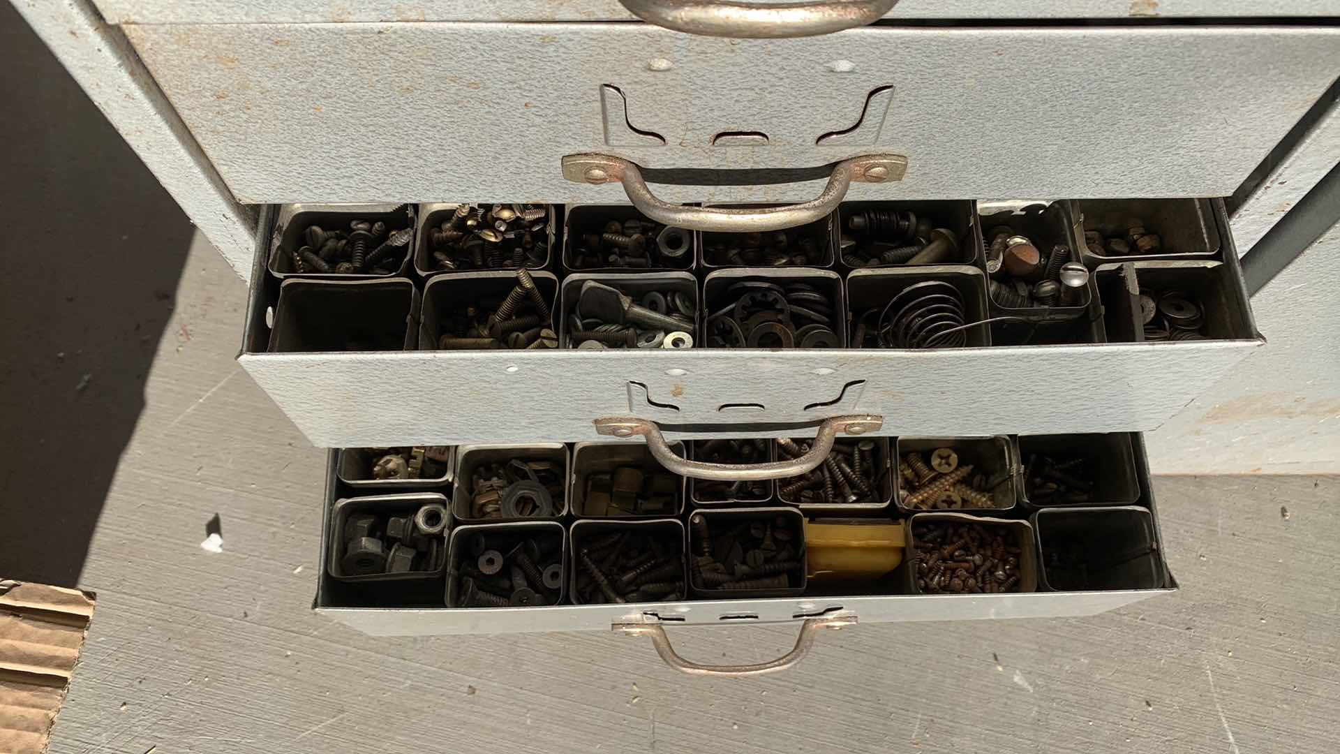 Photo 1 of LARGE METAL TOOL CHEST FILLED WITH ASSORTED SCREWS AND HARDWARE 26” X 10” H 30”