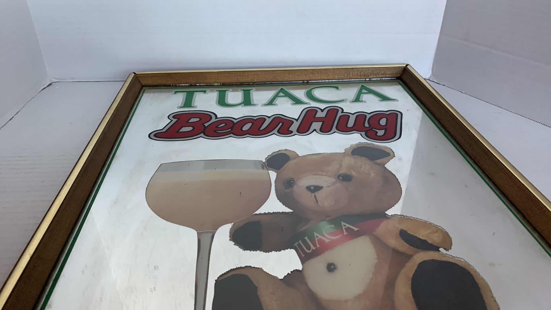 Photo 1 of VINTAGE TUACA BEARHUG MIRROR 17” X 21”