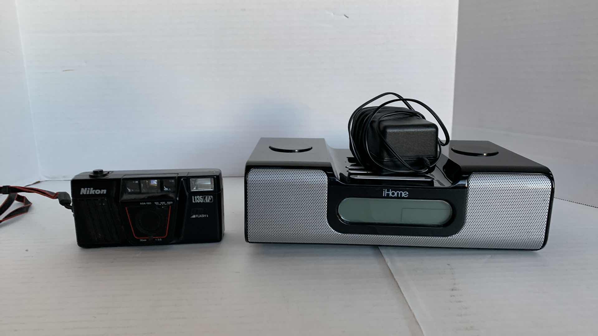 Photo 1 of IHOME SOUND SYSTEM AND NIKON CAMERA