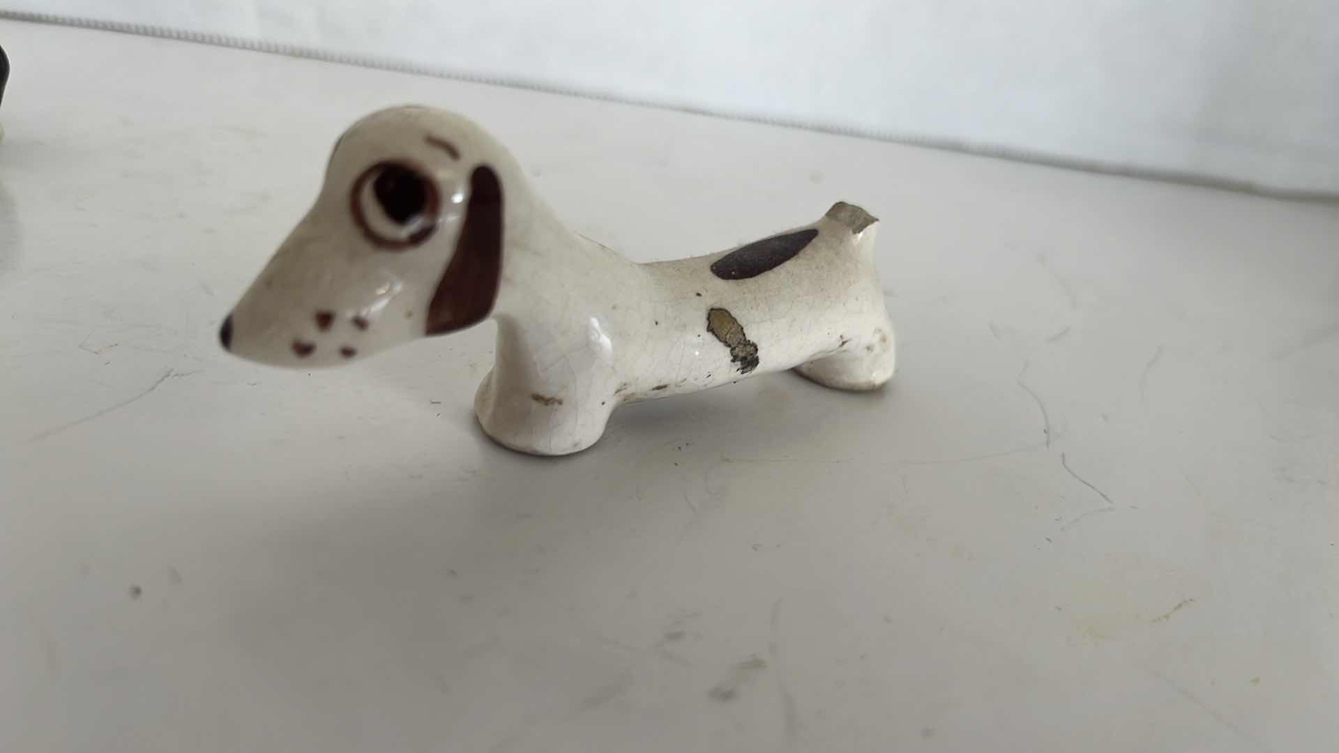 Photo 1 of 4” WEINER DOG FIGURINE