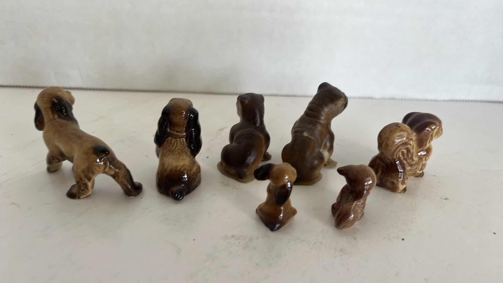 Photo 2 of 7-MINIATURE VINTAGE DOG FIGURINES (1/2” TO 1”)
