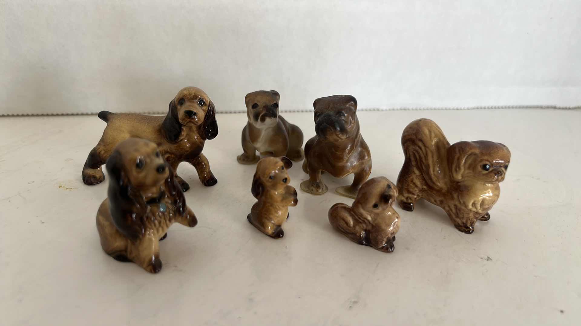 Photo 1 of 7-MINIATURE VINTAGE DOG FIGURINES (1/2” TO 1”)