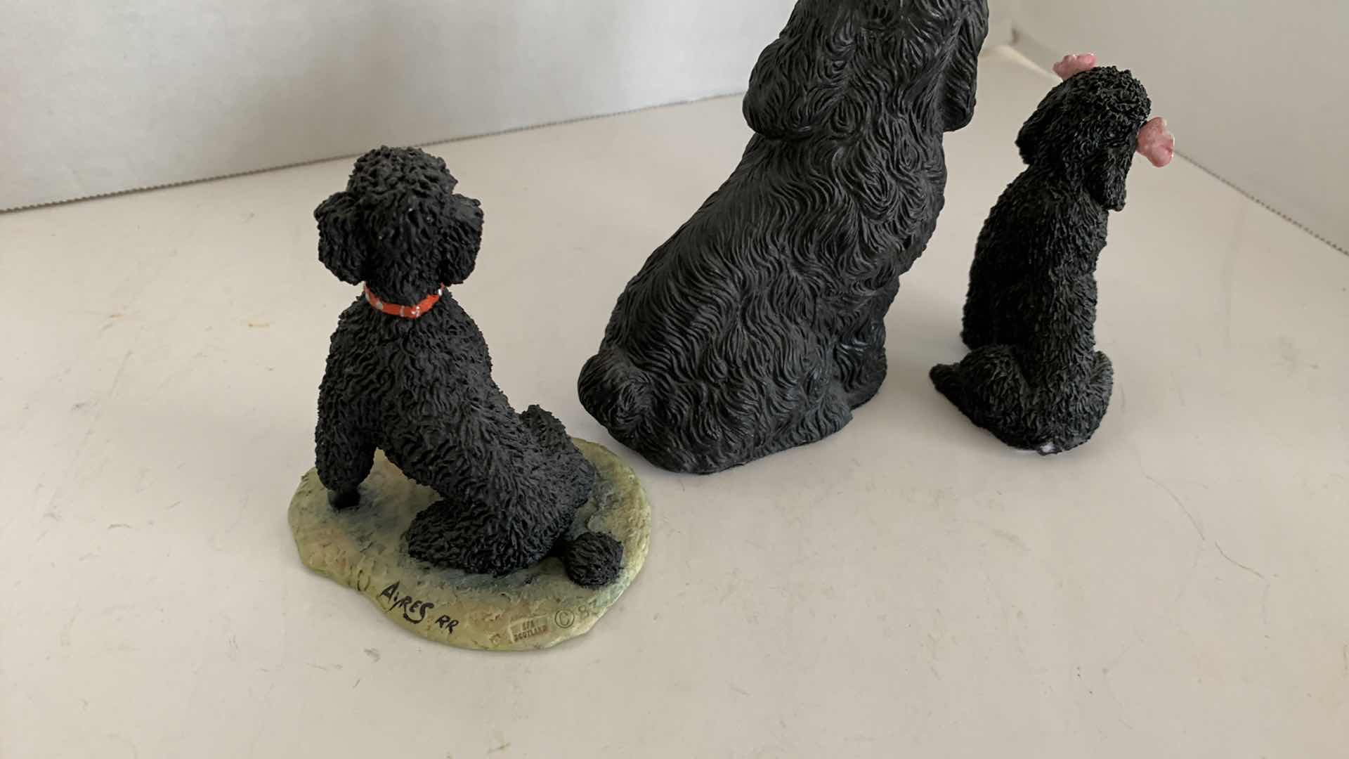 Photo 1 of 3-POODLE STATUES LARGEST IS 5” TALL