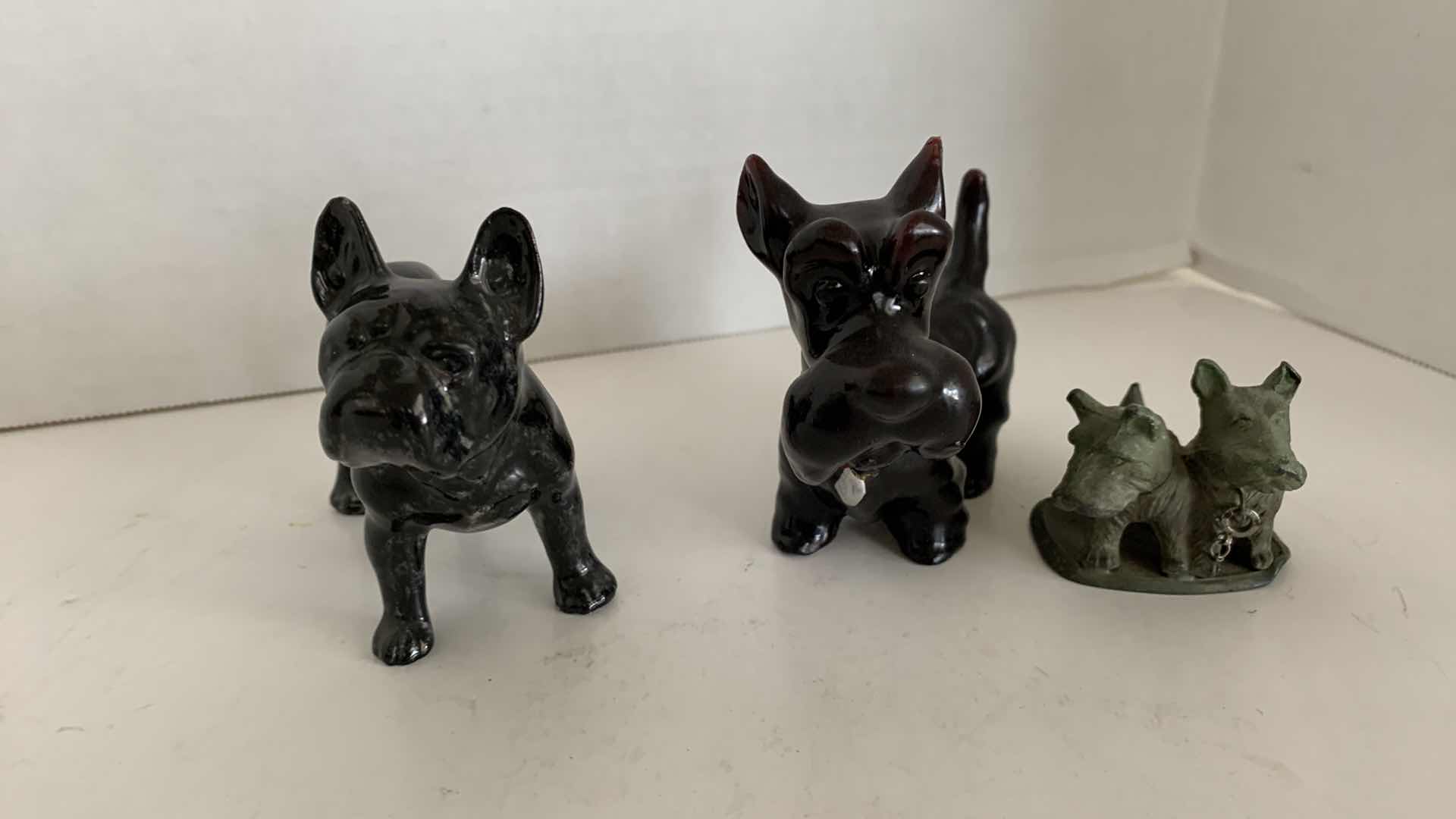Photo 1 of 3-TERRIER STATUES TALLEST IS 3.5”