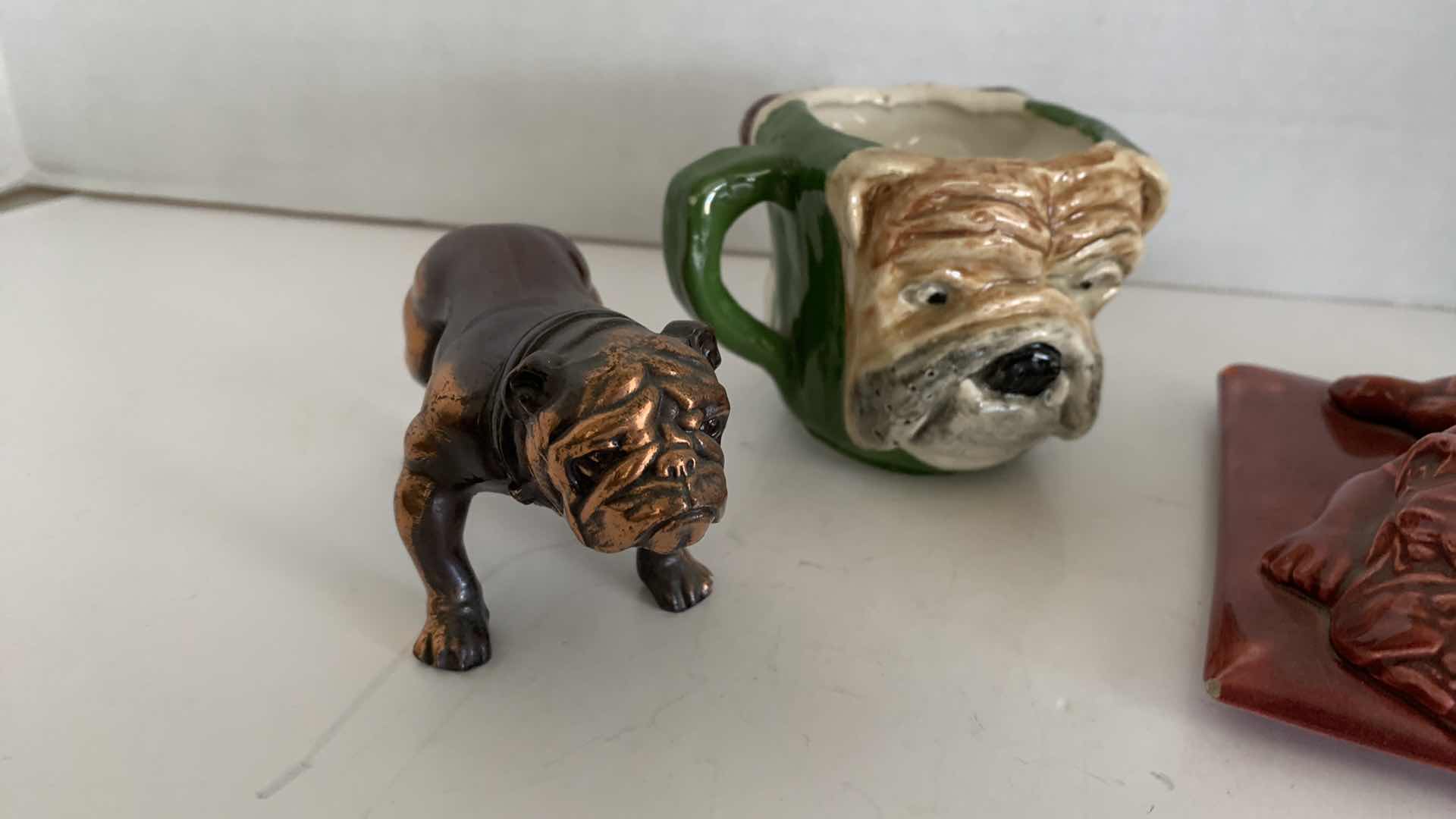 Photo 1 of 4-BULLDOG STATUES TALLEST IS 3”