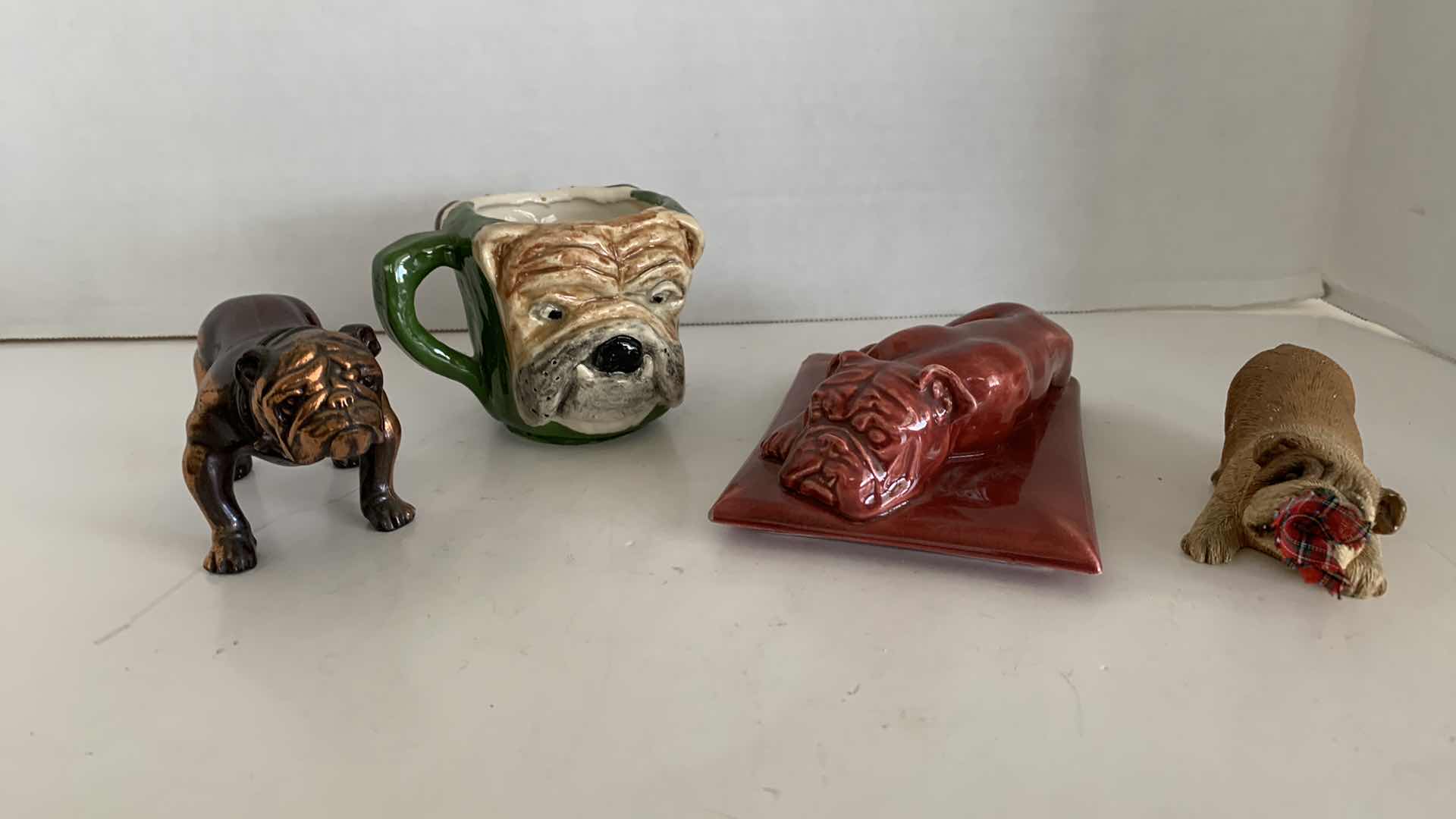 Photo 1 of 4-BULLDOG STATUES TALLEST IS 3”