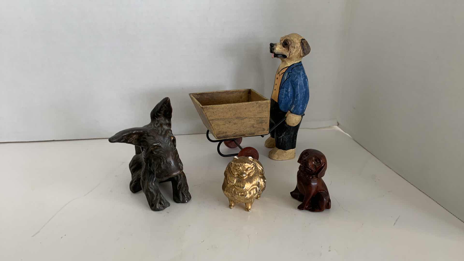 Photo 1 of 4-DOG STATUES 7” TALL