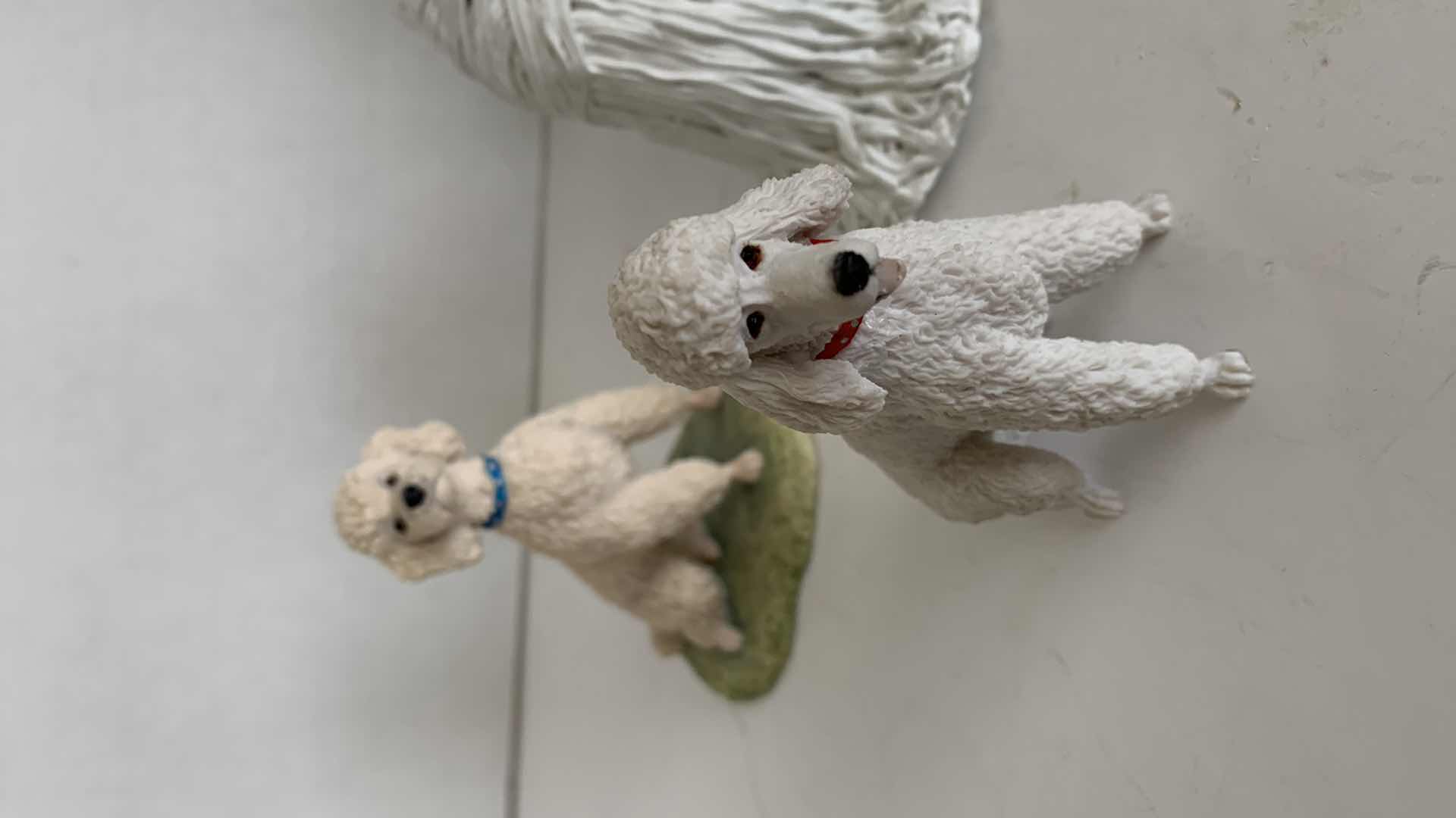 Photo 1 of 4-POODLE STATUES TALLEST IS 5”