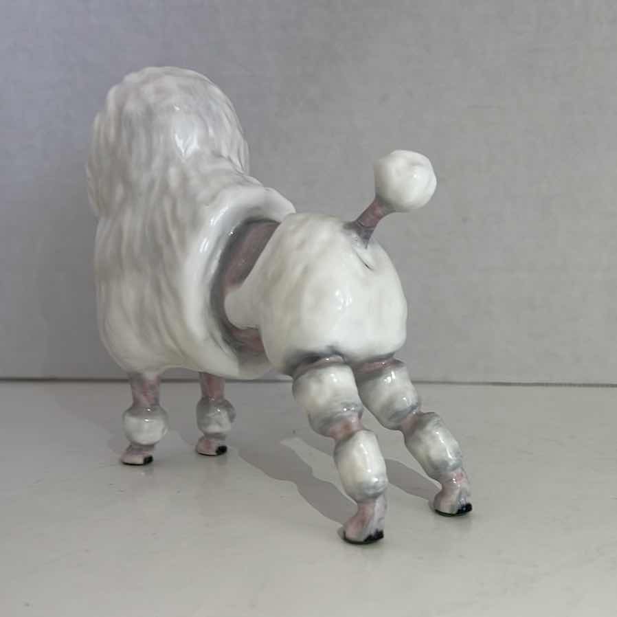 Photo 1 of ROYAL DOULTON FRENCH POODLE DOG FIGURINE 5.25”