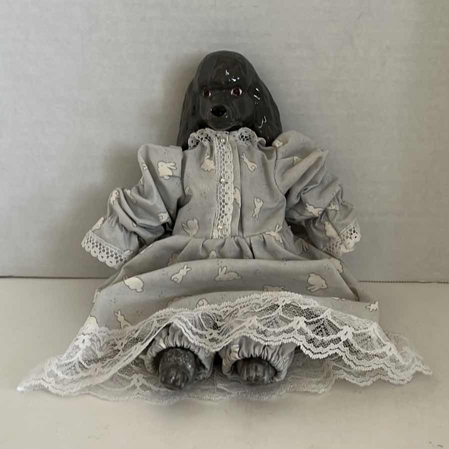Photo 1 of CERAMIC DOG COLLECTIBLE DOLL