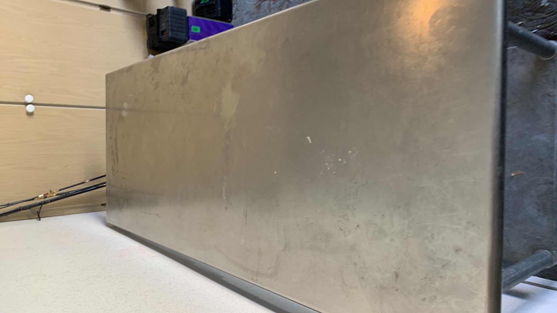 Photo 1 of TABCO STAINLESS STEEL TOP METAL UTILITY TABLE 72” X 30” H 34”