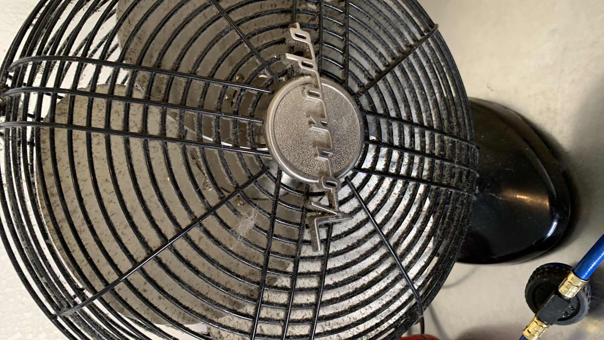 Photo 2 of GARAGE TOOLS AND ASSORTED ITEMS. CROW BAR, UTILITY PUMP, FAN AND NAILS.