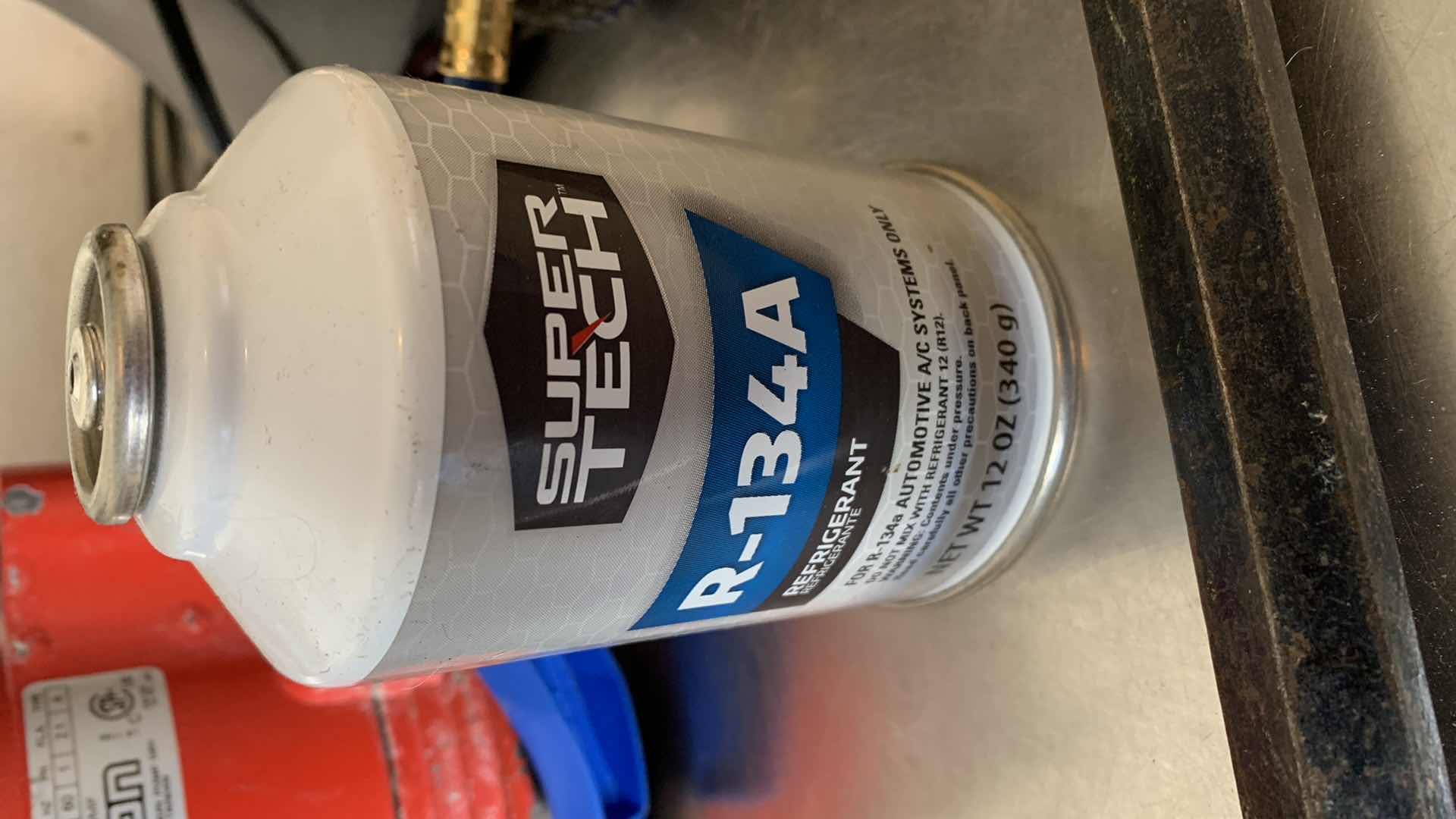 Photo 6 of GARAGE TOOLS AND ASSORTED ITEMS. CROW BAR, UTILITY PUMP, FAN AND NAILS.