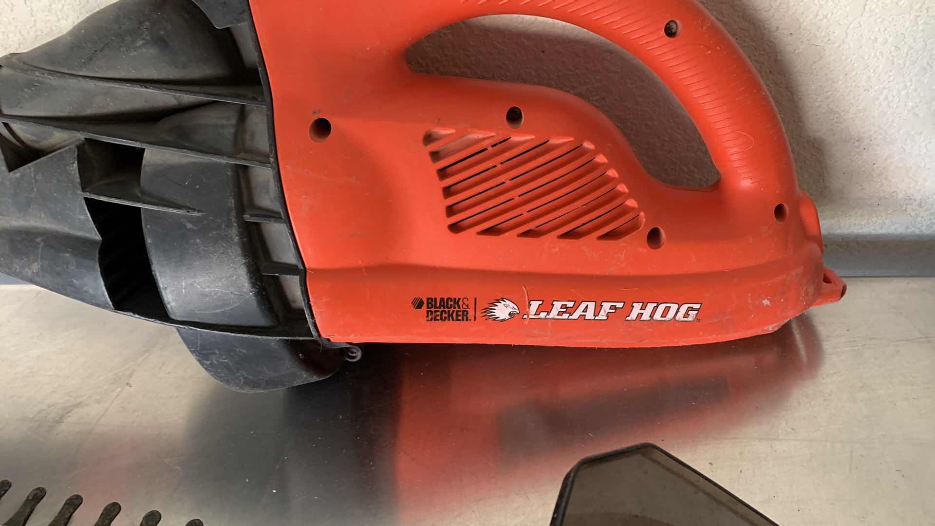 Photo 1 of BLACK AND DECKER LEAF BLOWER AND AN ELECTRIC CRAFTSMAN HEDGE TRIMMER