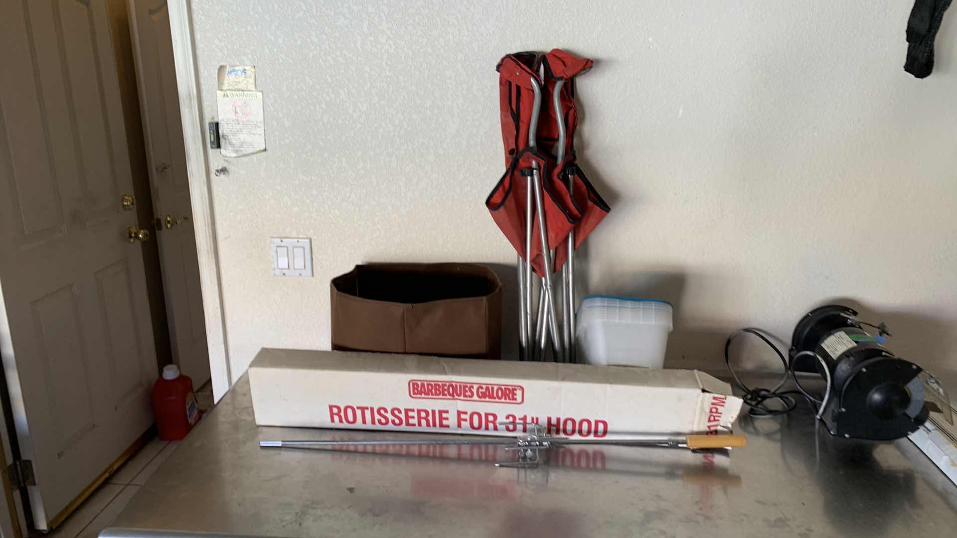 Photo 1 of VARIOUS MISCELANEOUS ITEMS- COOKING ROTISSERIE FOR 31" HOOD, CHAIR, AND STORAGE CONTAINERS