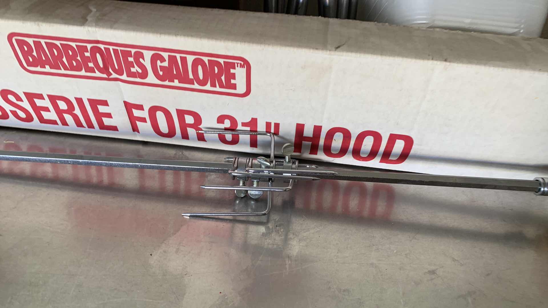 Photo 1 of VARIOUS MISCELANEOUS ITEMS- COOKING ROTISSERIE FOR 31" HOOD, CHAIR, AND STORAGE CONTAINERS