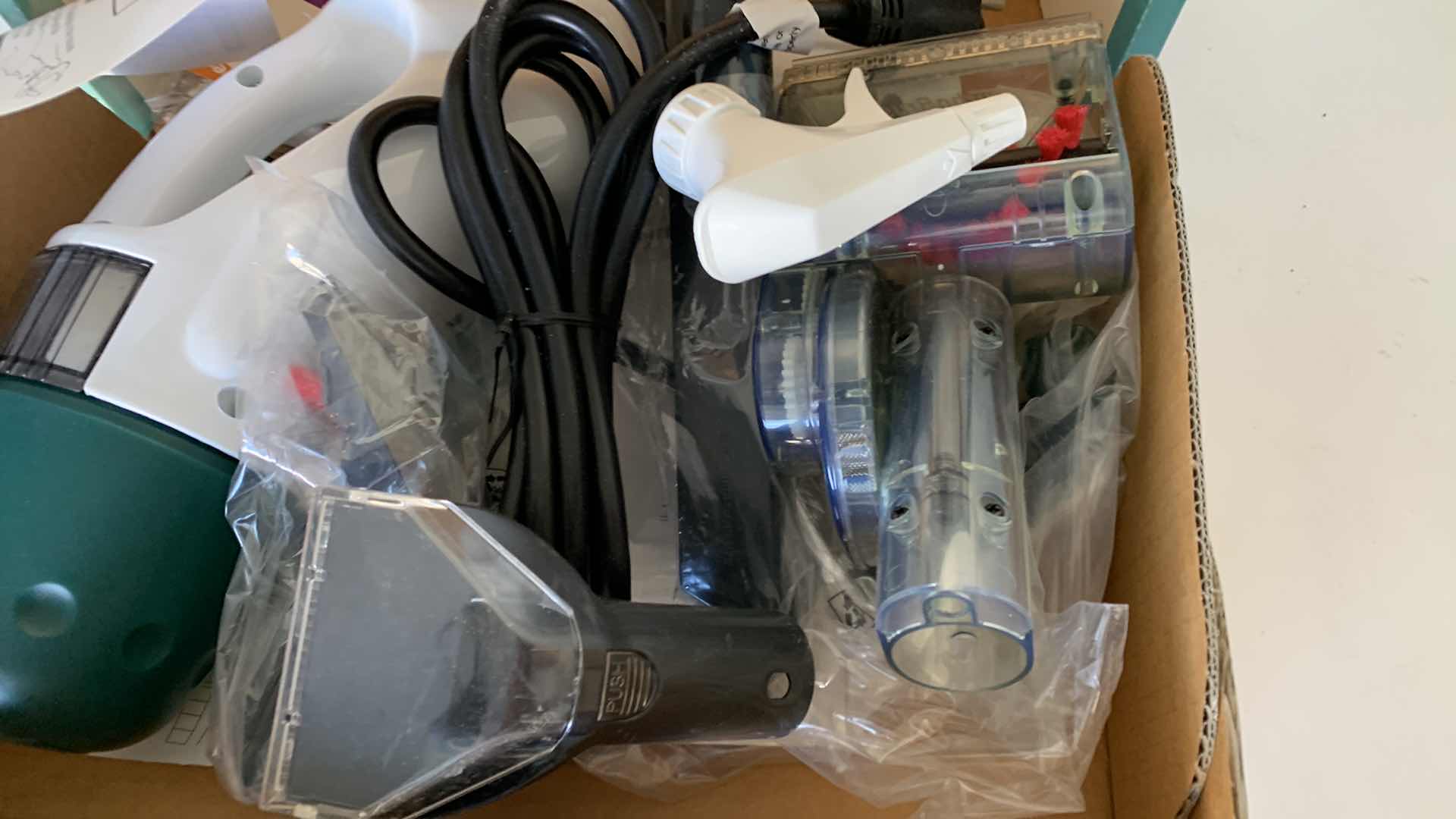 Photo 1 of BISSELL  HAND STEAM AND CLEAN DEVICE. 