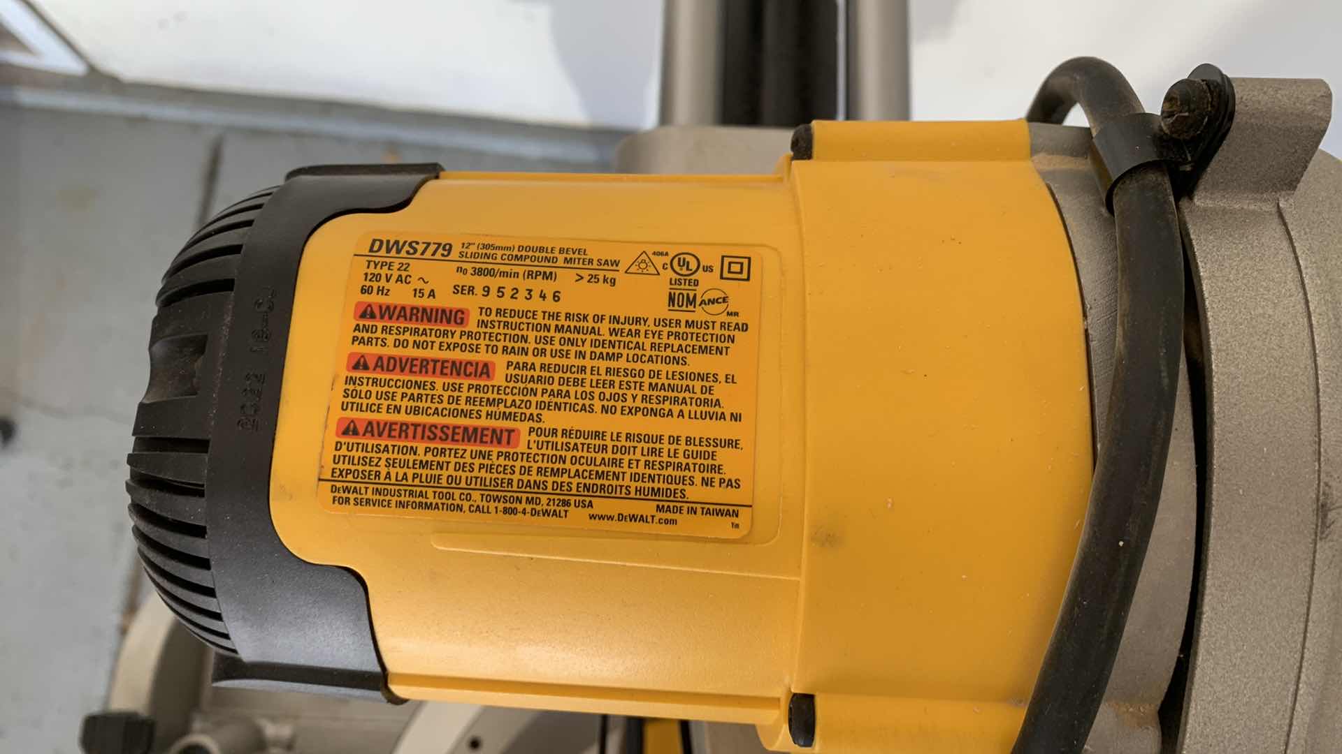 Photo 1 of DEWALT DWS779 12” DOUBLE BEVEL SLIDING COMPOUND MITER SAW AND A DWX723 HEAVY DUTY MITER SAW STAND