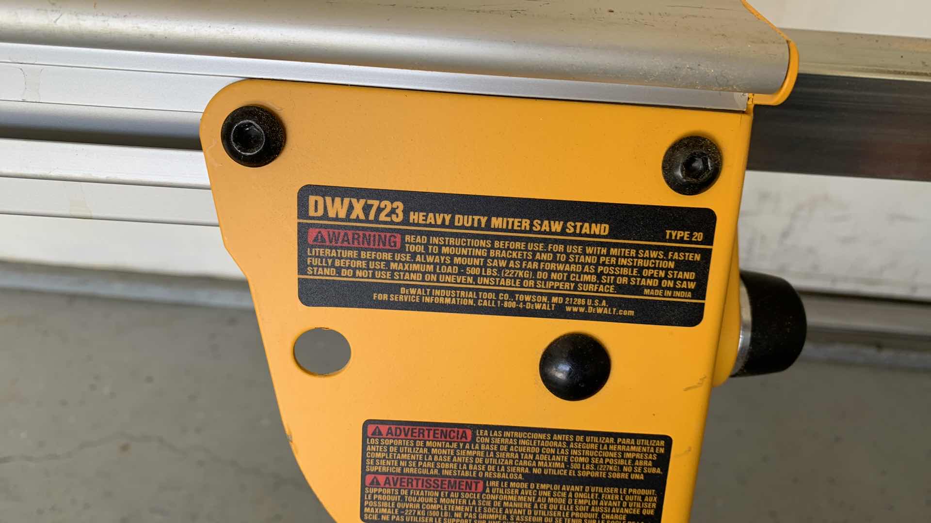 Photo 4 of DEWALT DWS779 12” DOUBLE BEVEL SLIDING COMPOUND MITER SAW AND A DWX723 HEAVY DUTY MITER SAW STAND