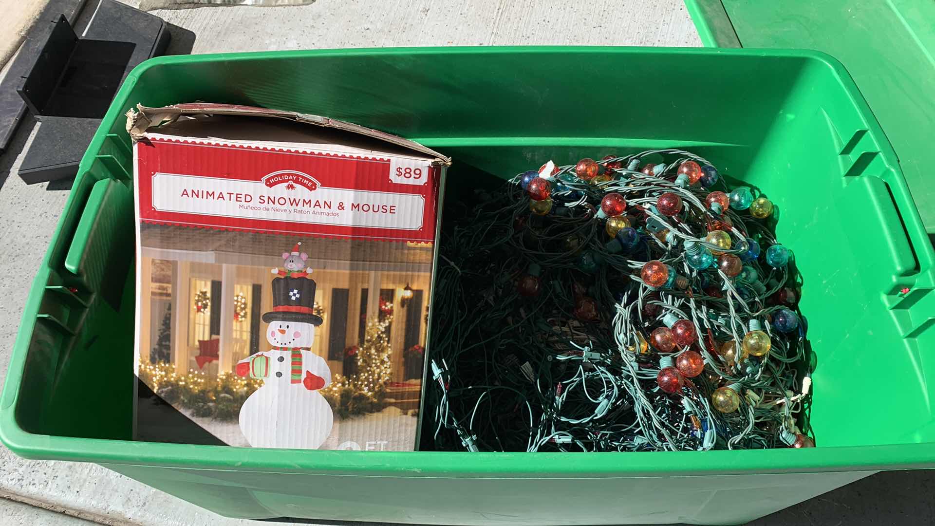 Photo 1 of CONTENTS OF TOTE -9' ANIMATED SNOWMAN AND CHRISTMAS LIGHTS
