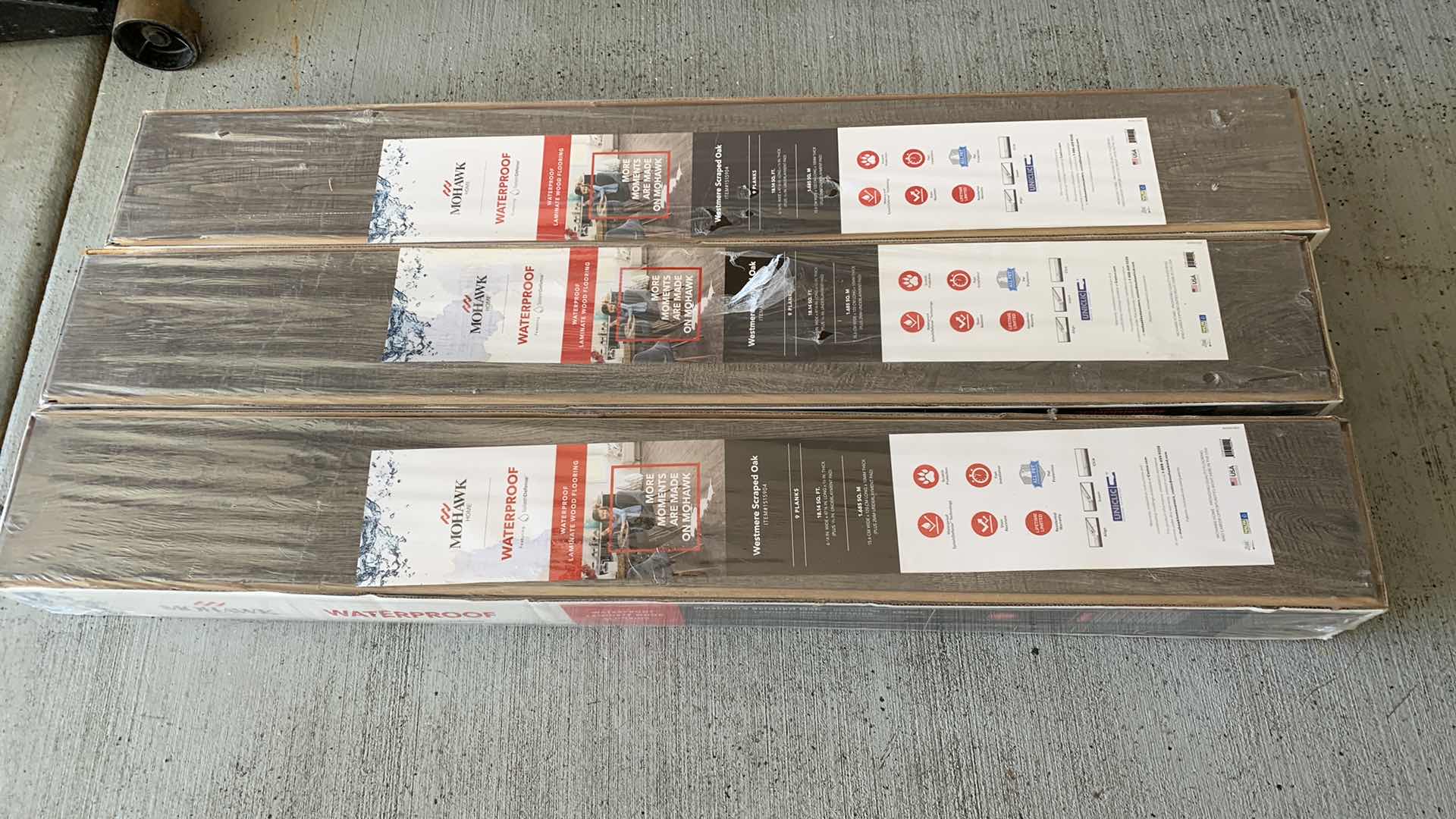 Photo 1 of 3-MOHAWK WATERPROOF LAMINATE WOOD FLOORING