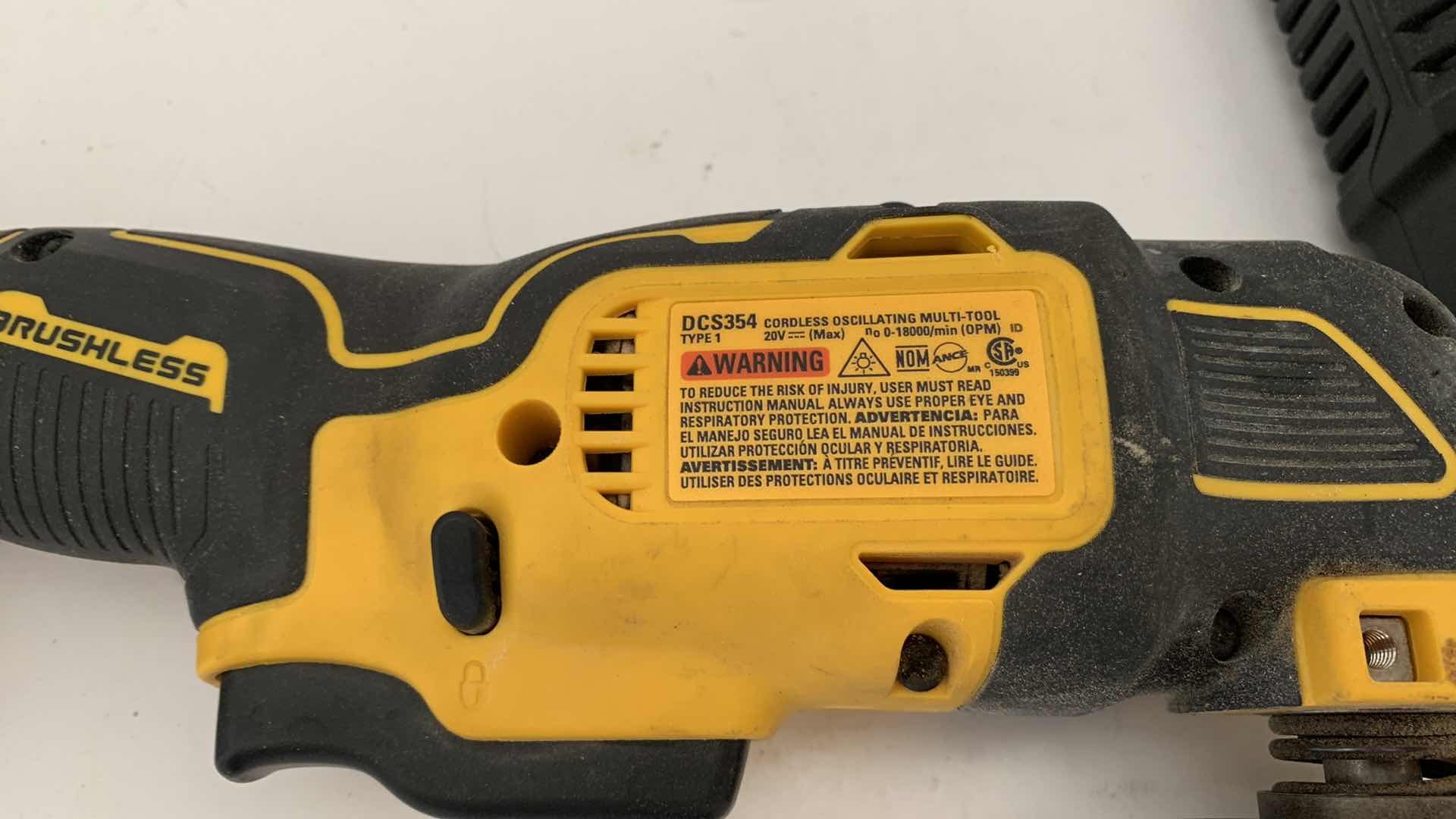 Photo 1 of DEWALT CORDLESS OSCILLATING MULTI-TOOL AND BATTERY CHARGER