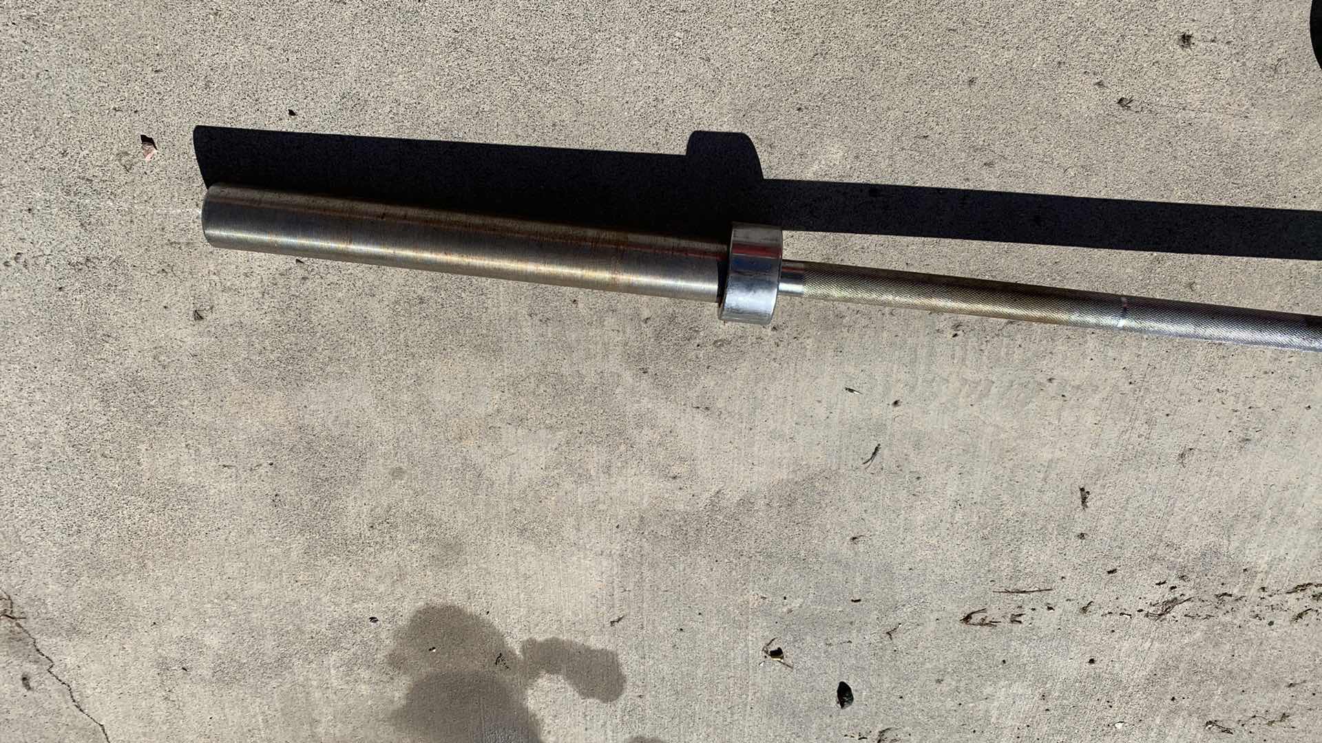 Photo 3 of EXERCISE EQUIPTMENT OLYMPIC BARBELL