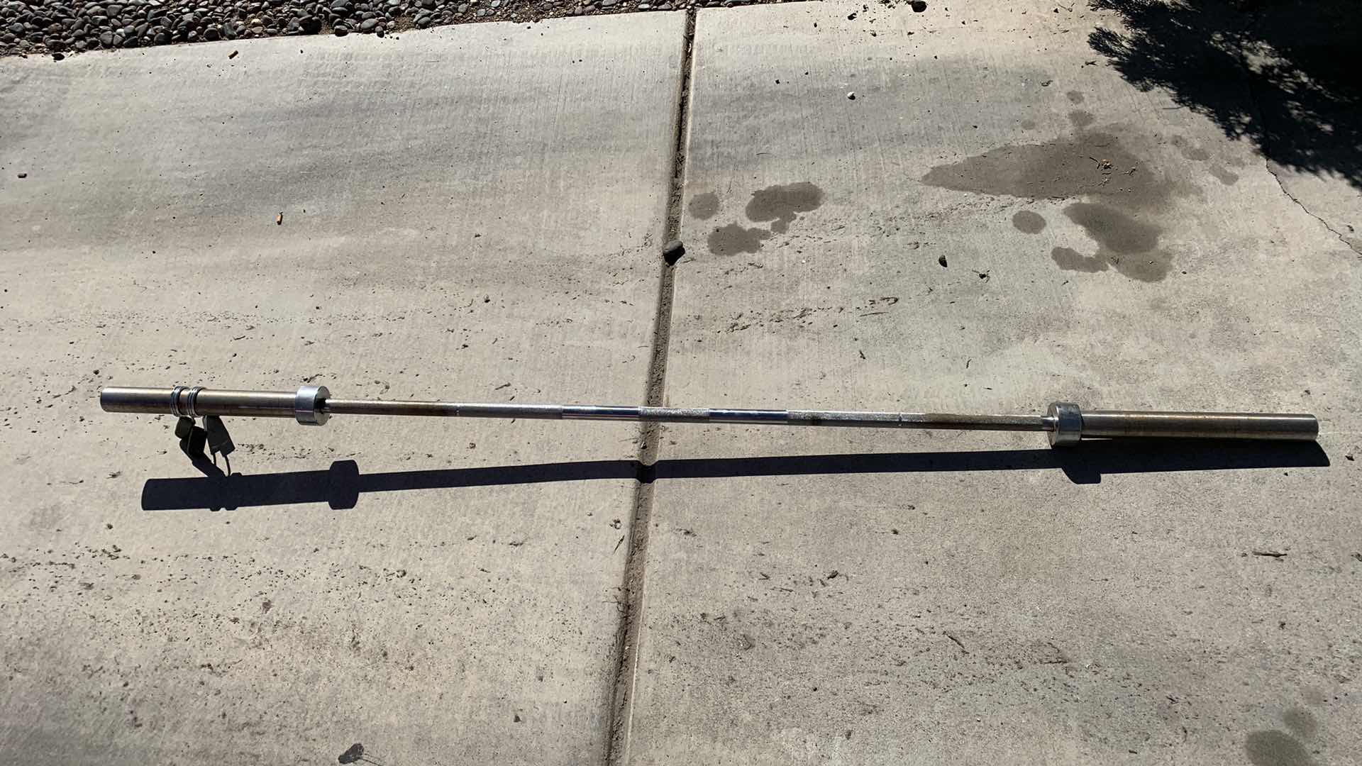 Photo 1 of EXERCISE EQUIPTMENT OLYMPIC BARBELL