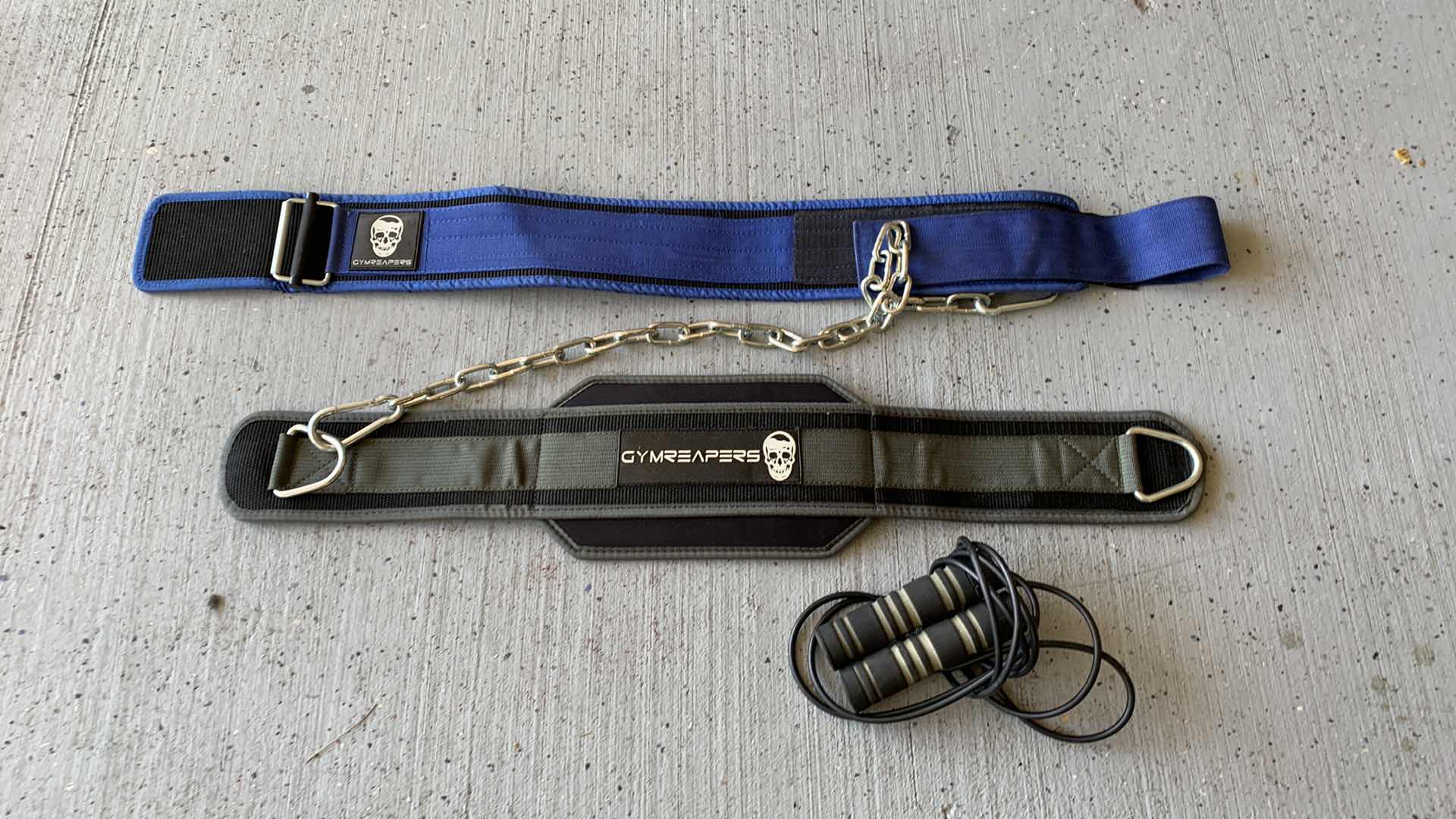 Photo 1 of 2-WEIGHTLIFTING BELTS AND A JUMP ROPE