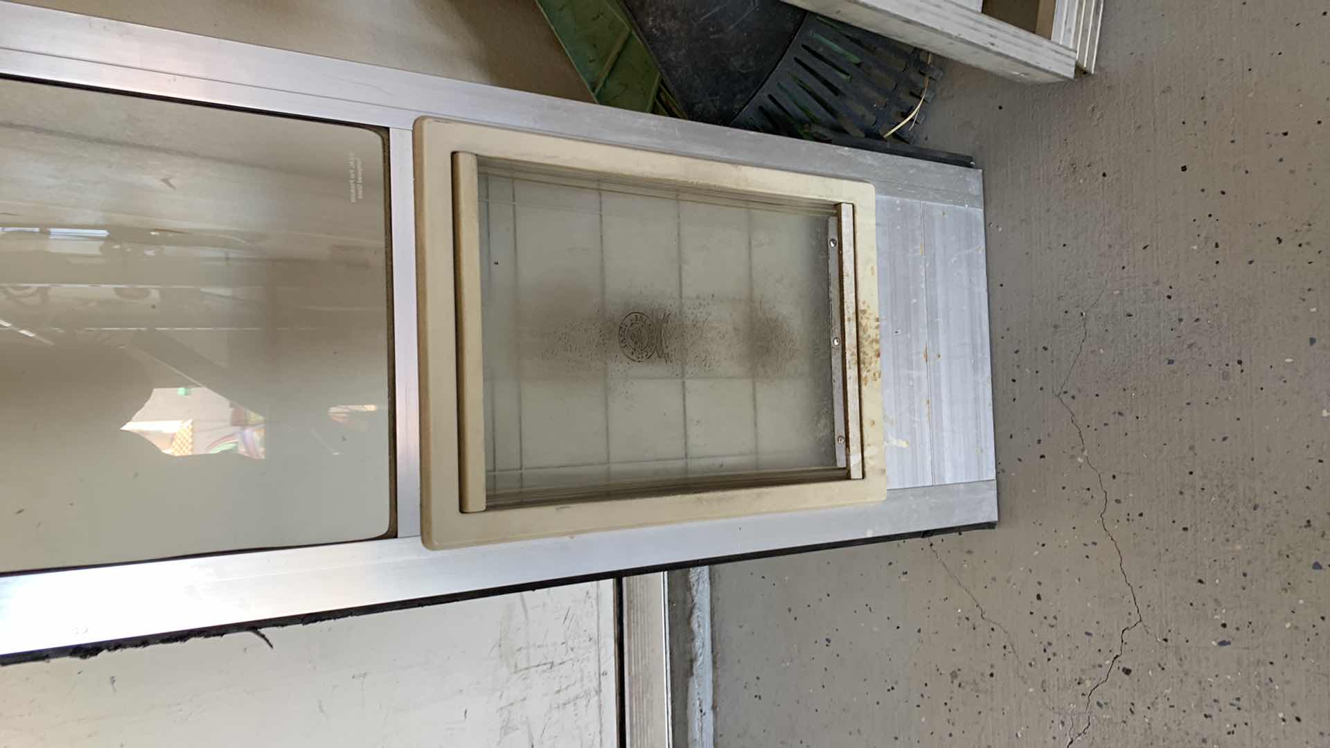 Photo 1 of DOGGY DOOR FOR SLIDING GLASS DOOR 15” X 80”