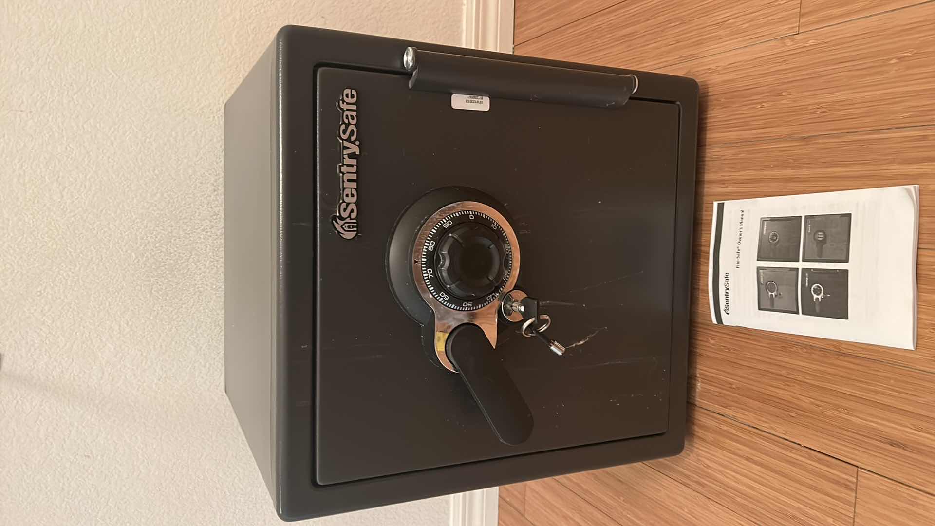 Photo 1 of SENTRY SAFE WITH KEY AND OWNERS MANUAL 16” x 20” H18”