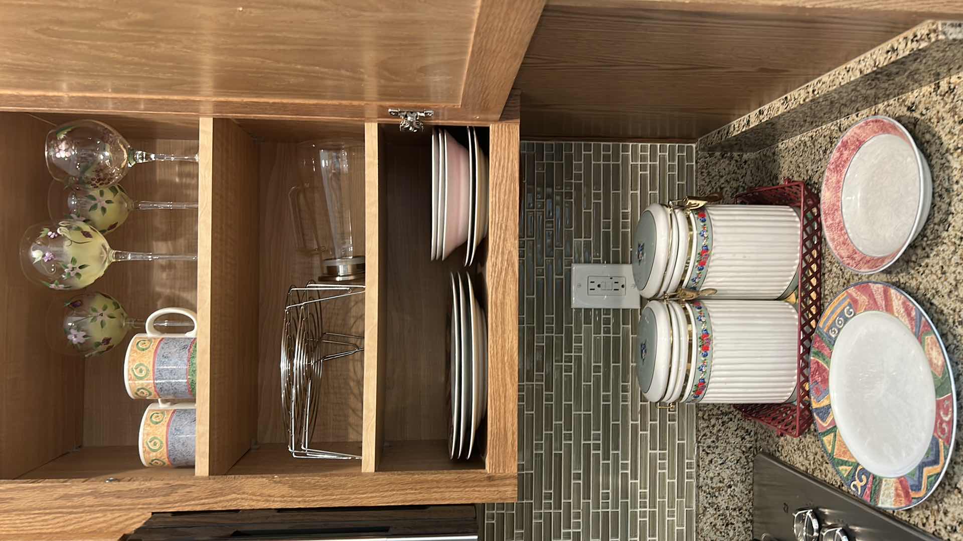 Photo 1 of CONTENTS OF KITCHEN CABINET AND COUNTERTOP DISHES AND GLASSWARE