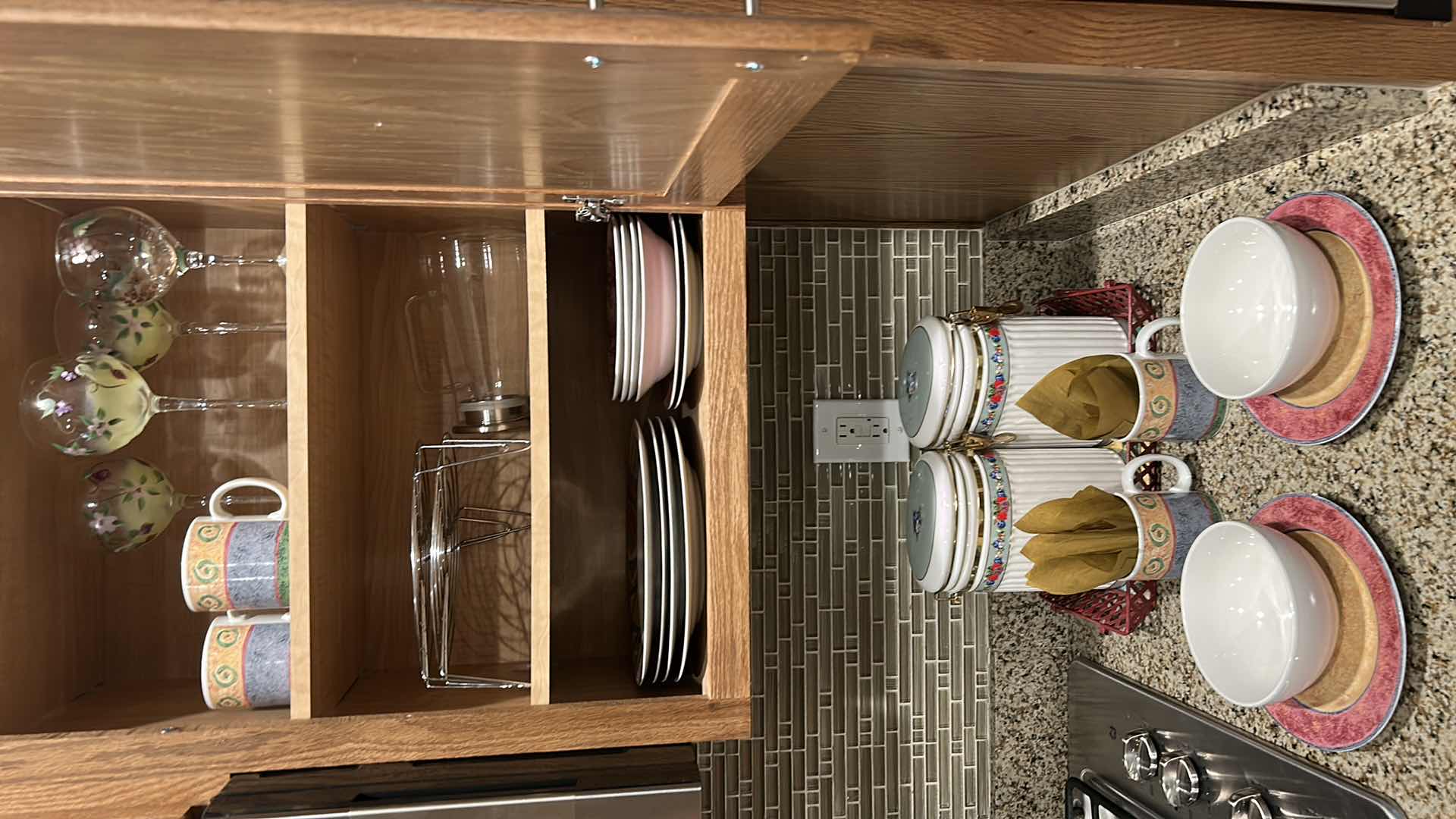 Photo 1 of CONTENTS OF KITCHEN CABINET AND COUNTERTOP DISHES AND GLASSWARE