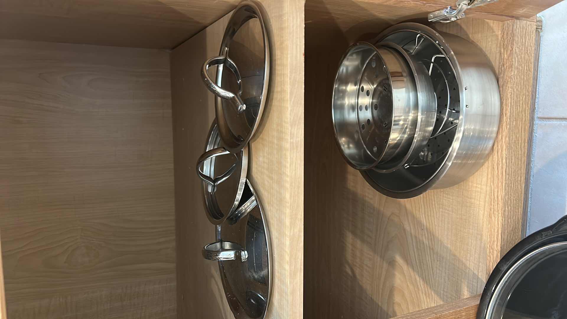 Photo 2 of CONTENTS OF KITCHEN CABINET - POTS AND PANS