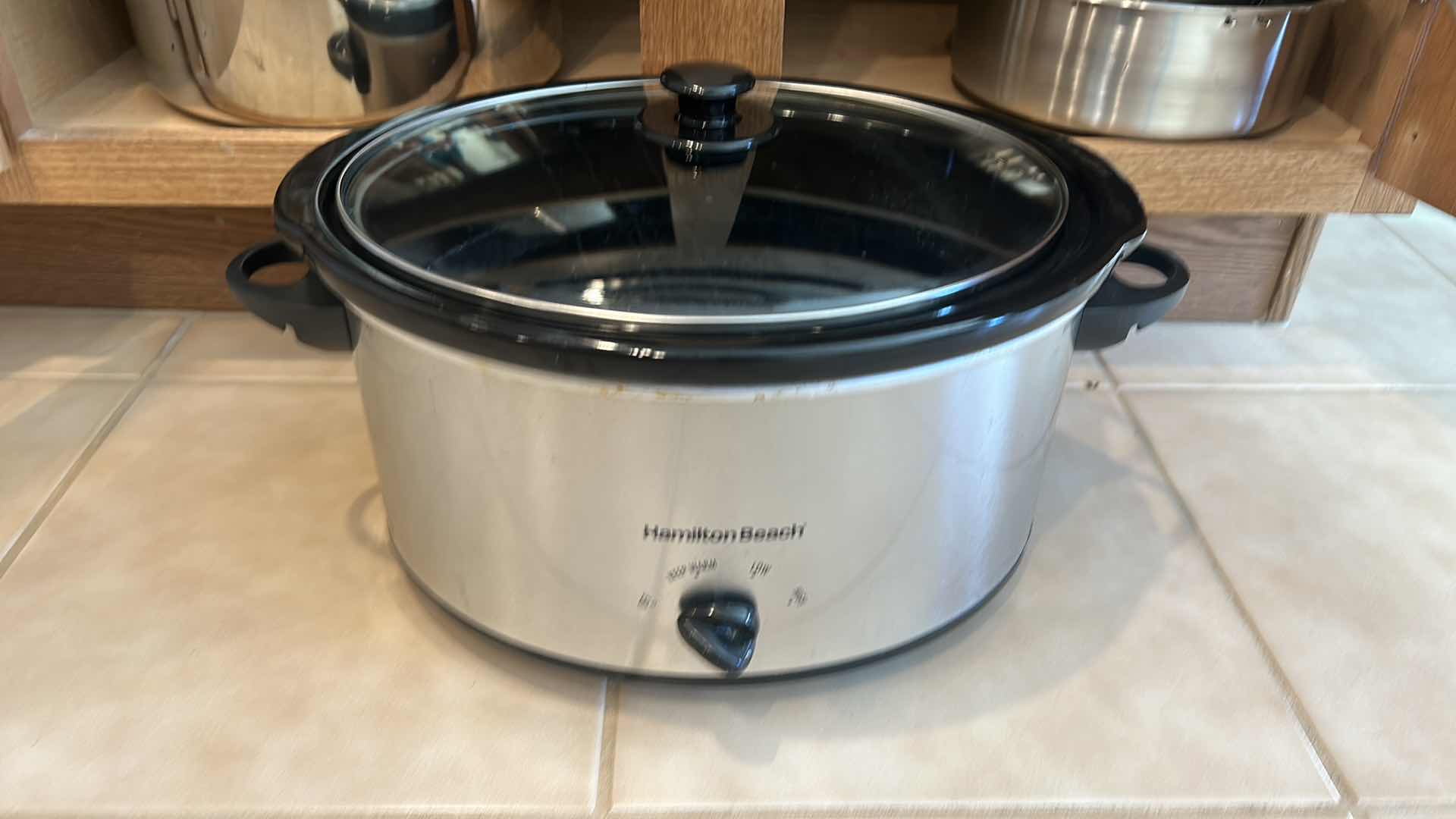 Photo 4 of CONTENTS OF KITCHEN CABINET - POTS AND PANS