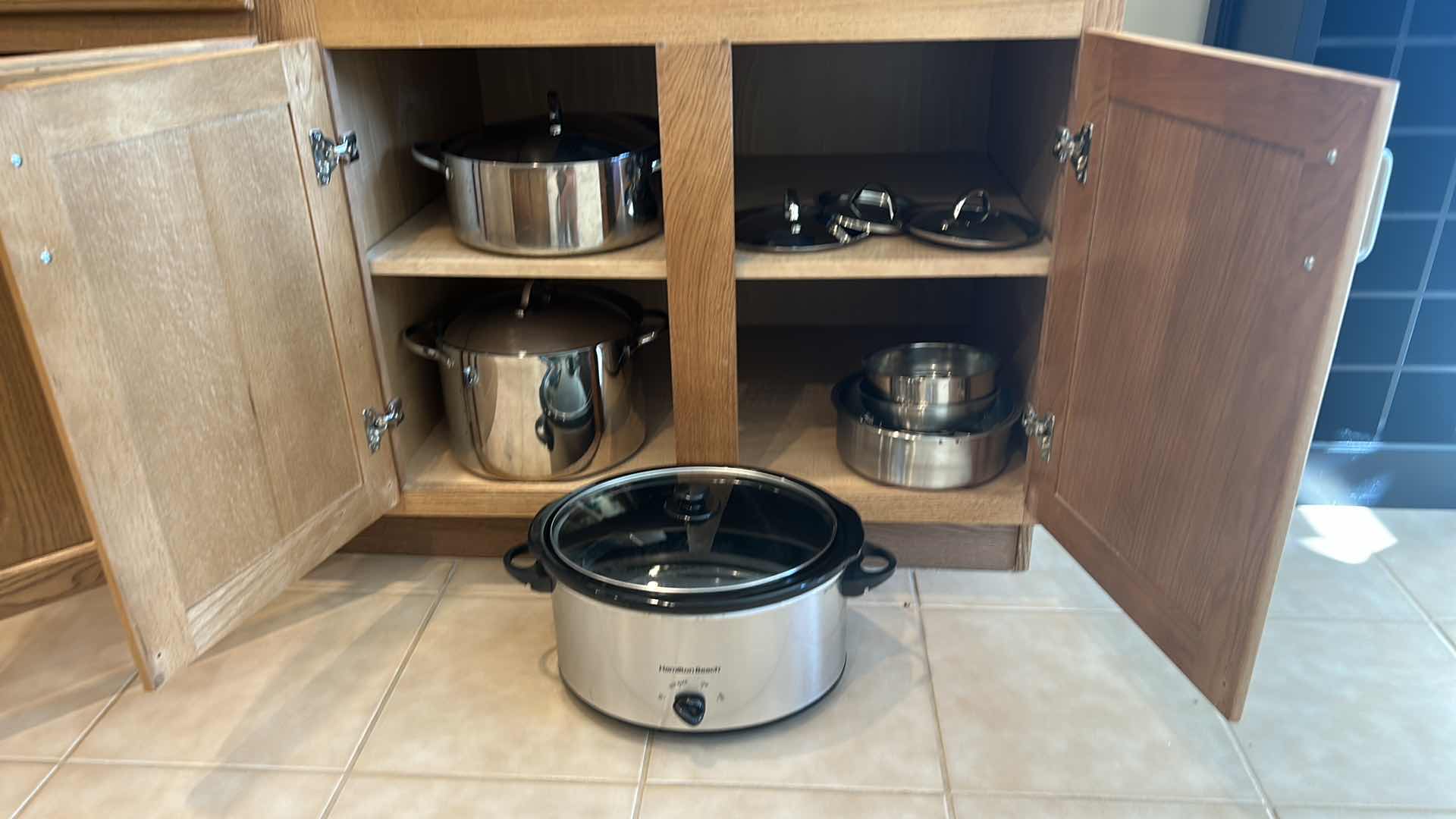 Photo 5 of CONTENTS OF KITCHEN CABINET - POTS AND PANS