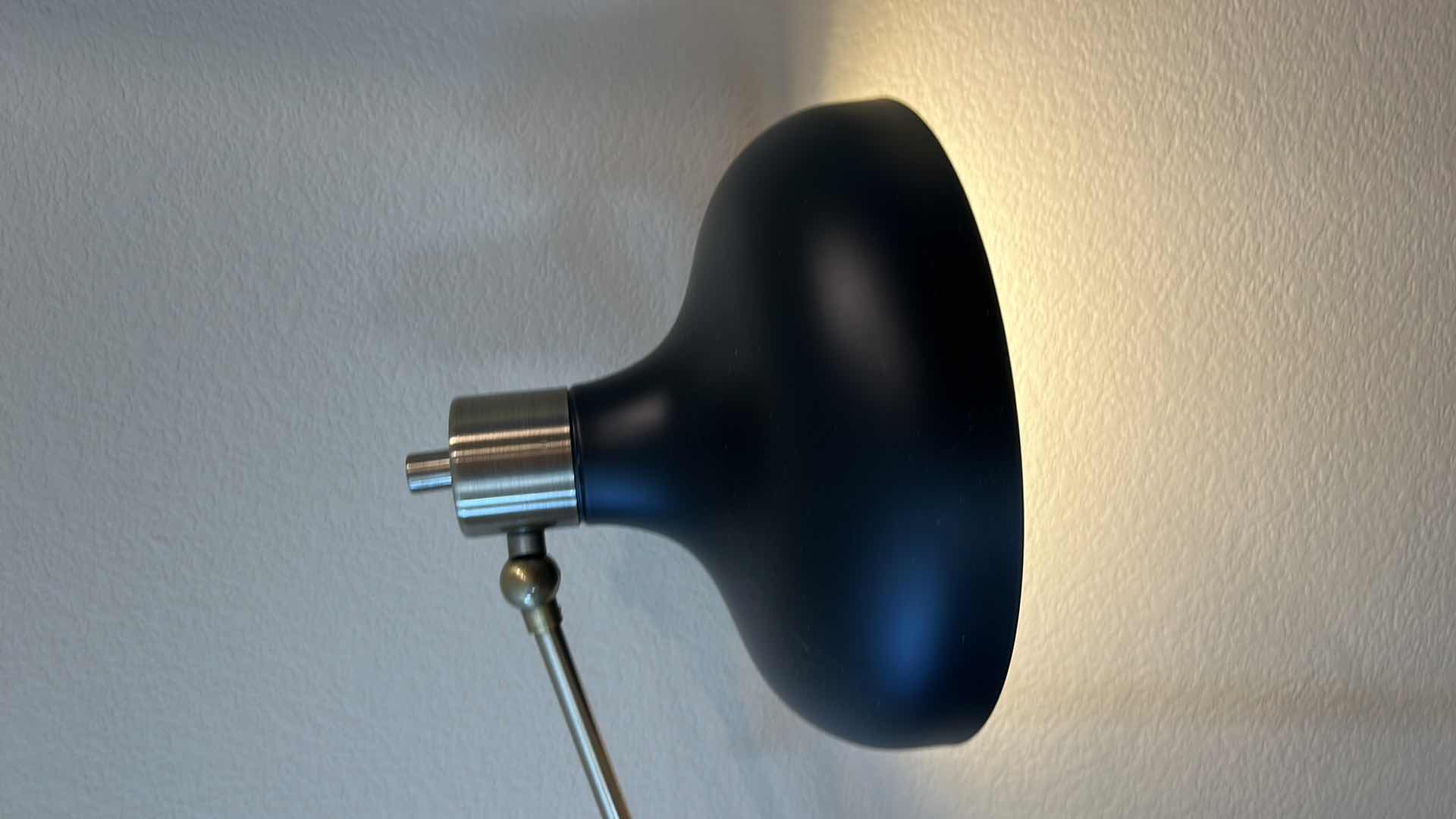 Photo 1 of BRASS AND BLACK METAL ADJUSTABLE FLOOR LAMP  (pictured at 55" high)