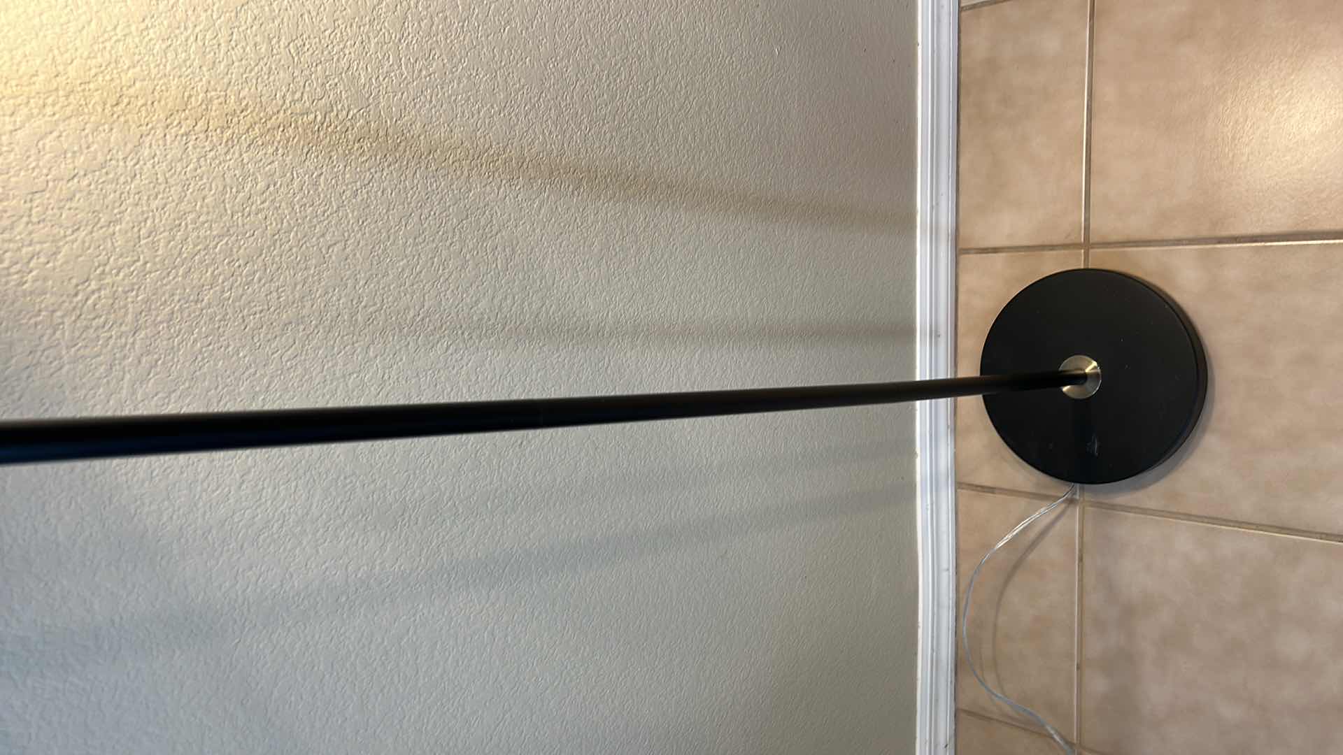 Photo 1 of BRASS AND BLACK METAL ADJUSTABLE FLOOR LAMP  (pictured at 55" high)