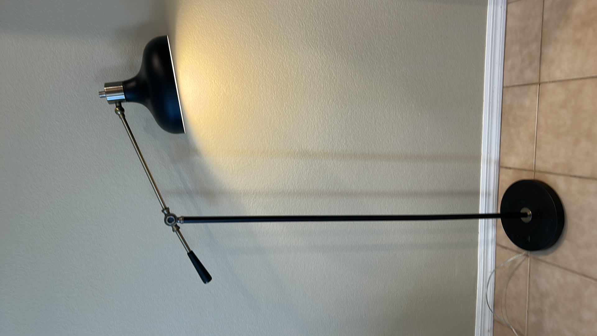 Photo 1 of BRASS AND BLACK METAL ADJUSTABLE FLOOR LAMP  (pictured at 55" high)