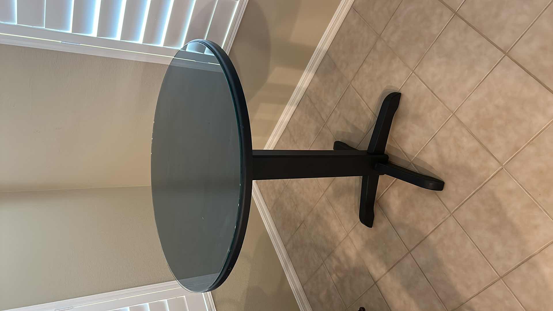 Photo 1 of BLACK PUB TABLE WITH GLASS TOP 36" H 42"