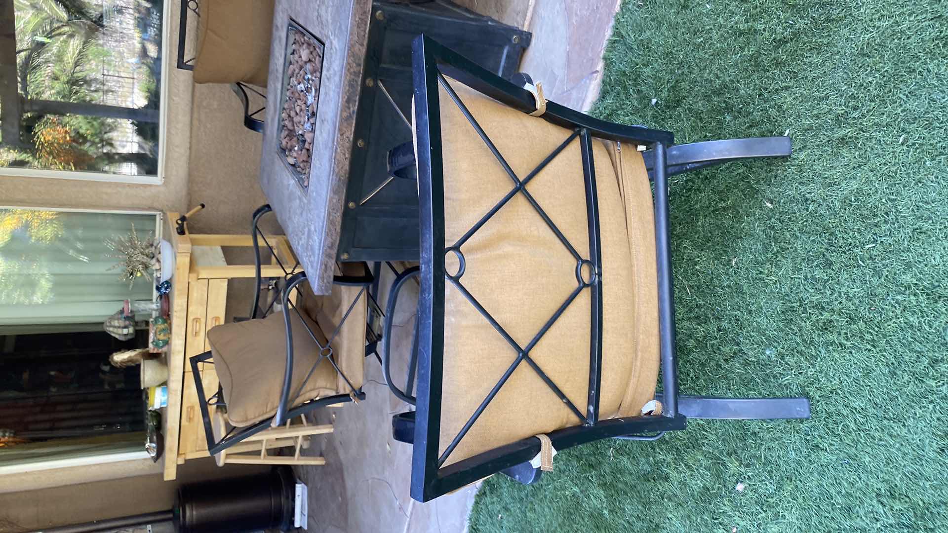 Photo 1 of 5 PIECE PATIO SET 4 CHAIRS AND FIREPIT UNTESTED